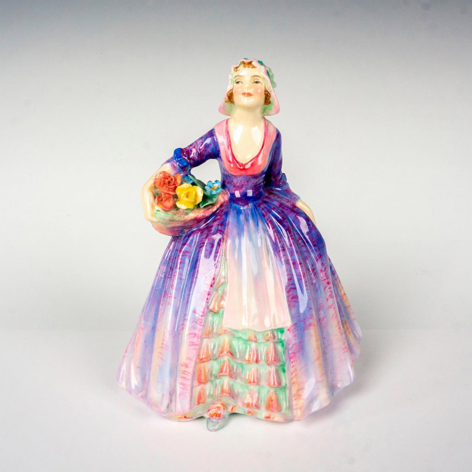 Janet - HN1538 - Royal Doulton Figurine: Artist: Leslie Harradine Issued: 1932 - 1949 Dimensions: 6.25"H Manufacturer: Royal Doulton Country of Origin: England