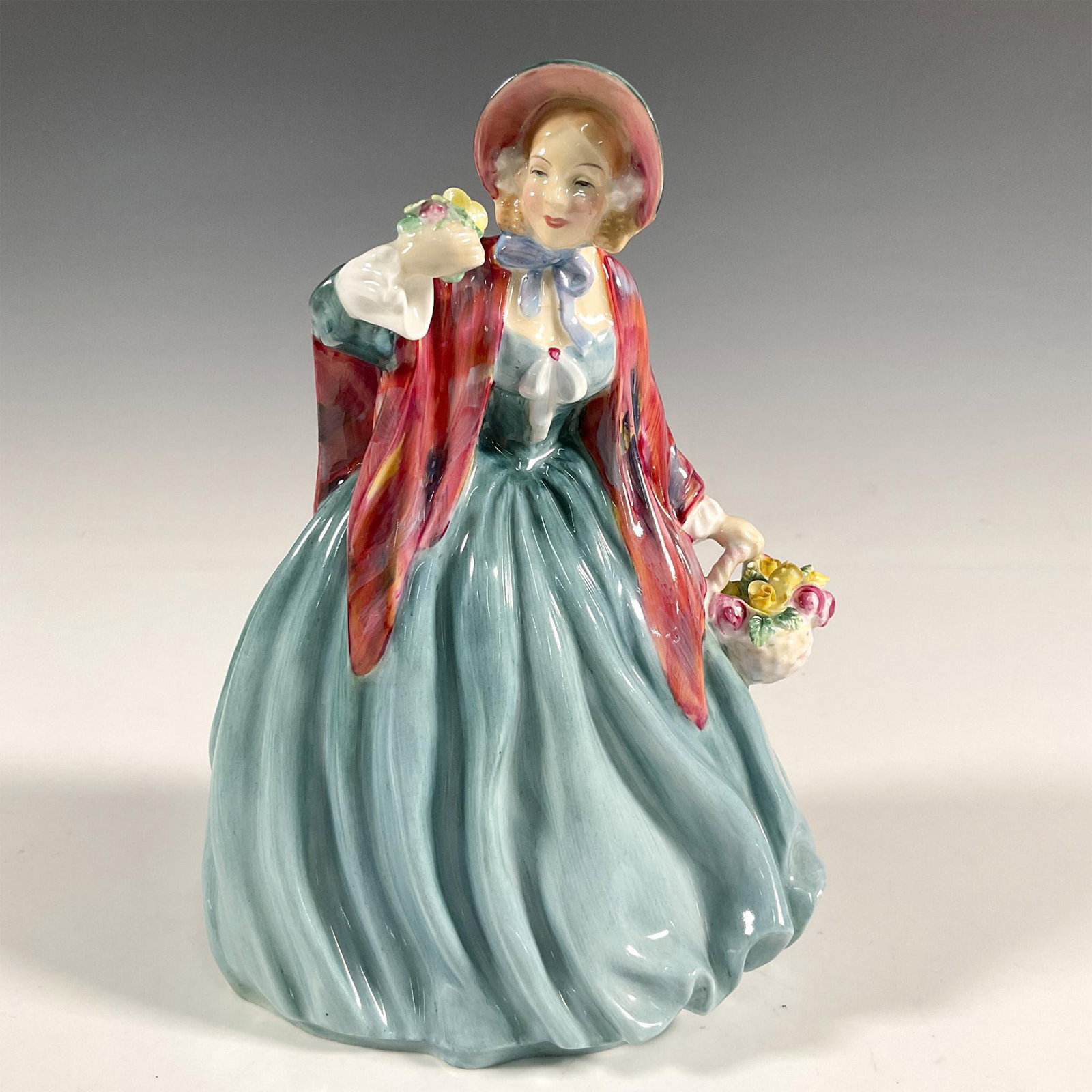 Lady Charmian - HN1948 - Royal Doulton Figurine: Artist: Leslie Harradine Issued: 1940 - 1973 Dimensions: 8"H Manufacturer: Royal Doulton Country of Origin: England