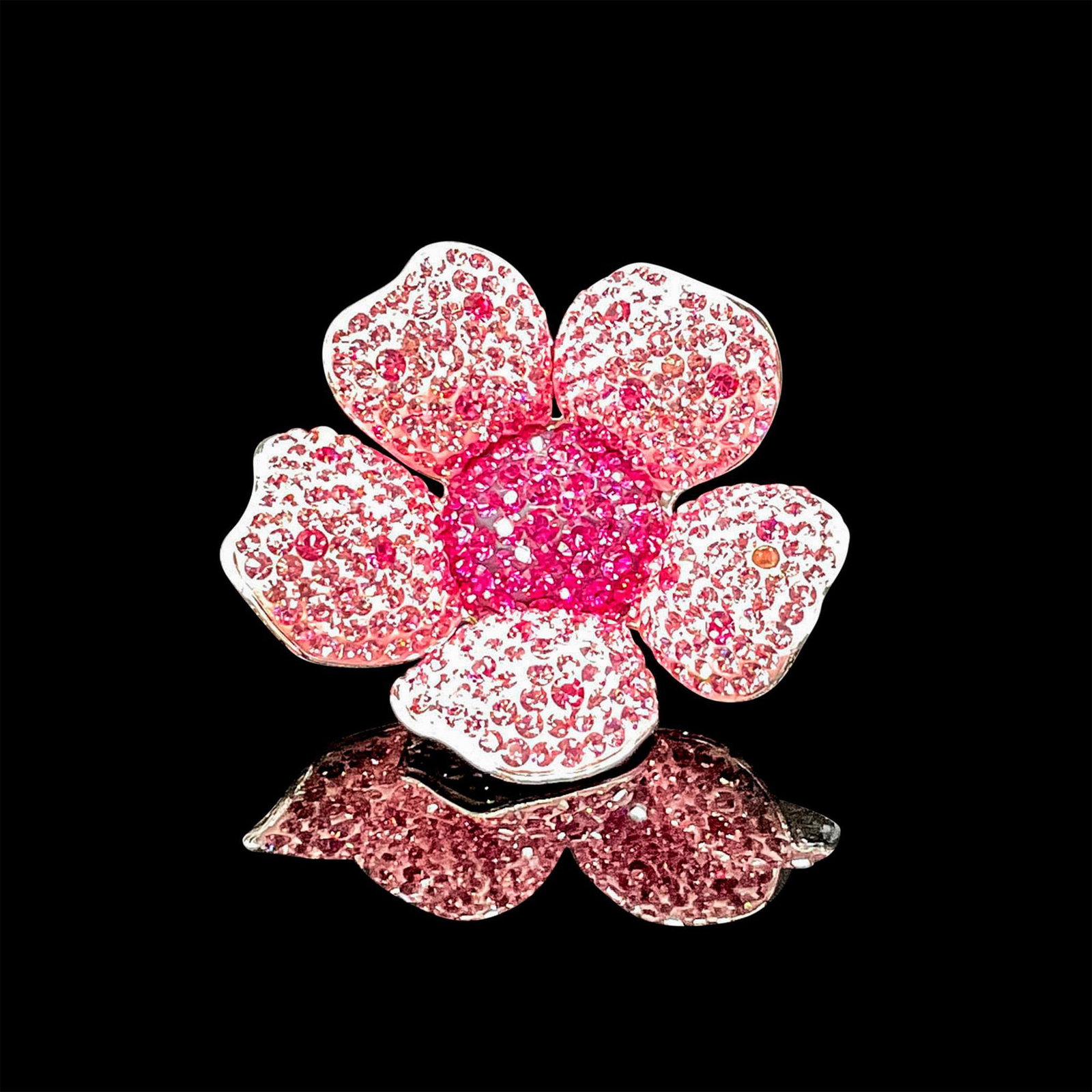 Swarovski Crystal Figurine, Mother's Pink Blossom: Pink crystals adorn petals on floral figurine, set on carved embellished rhodium stem. Swarovski impressed mark. This item has its original box: 3.5"L x 3.5"W x 2.25"H. Certificate of Authenticity inc