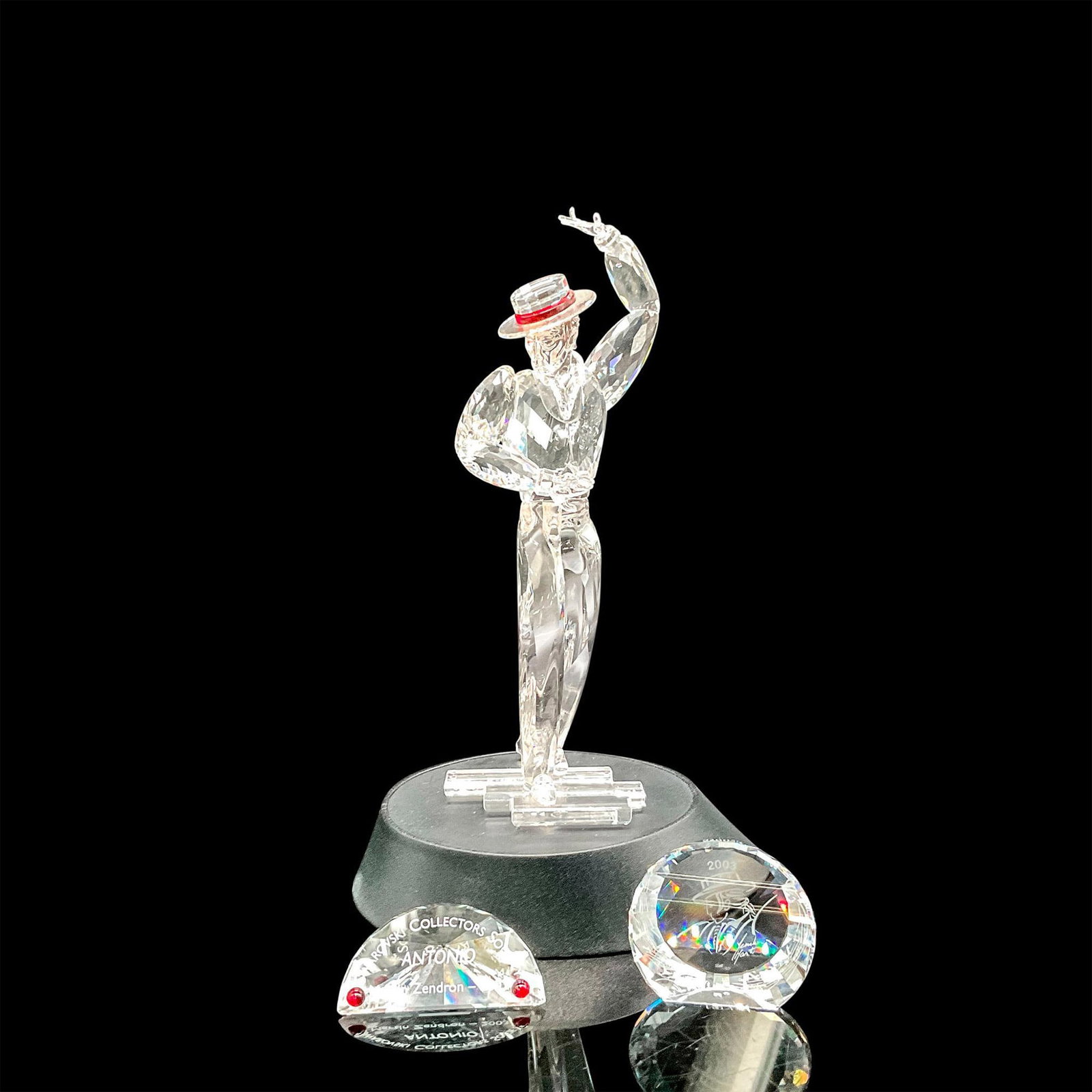 Swarovski Crystal Figurine, Plaque & Paperweight, Antonio: Part of the Magic of Dance trilogy. Exquisite crystal design of dance. Also includes 2003 embossed Collector's Society plaque and Antonio paperweight. Swarovski backstamp. This item has its original b
