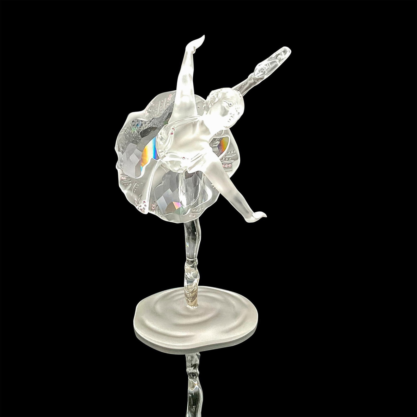Swarovski Silver Crystal Figurine, Ballerina: Part of the When we were Young series. Clear and frosted figure in dance pose on frosted base. Dress and hair are accented with pink crystals. Swarovski backstamp. This item has its original box: 7.25