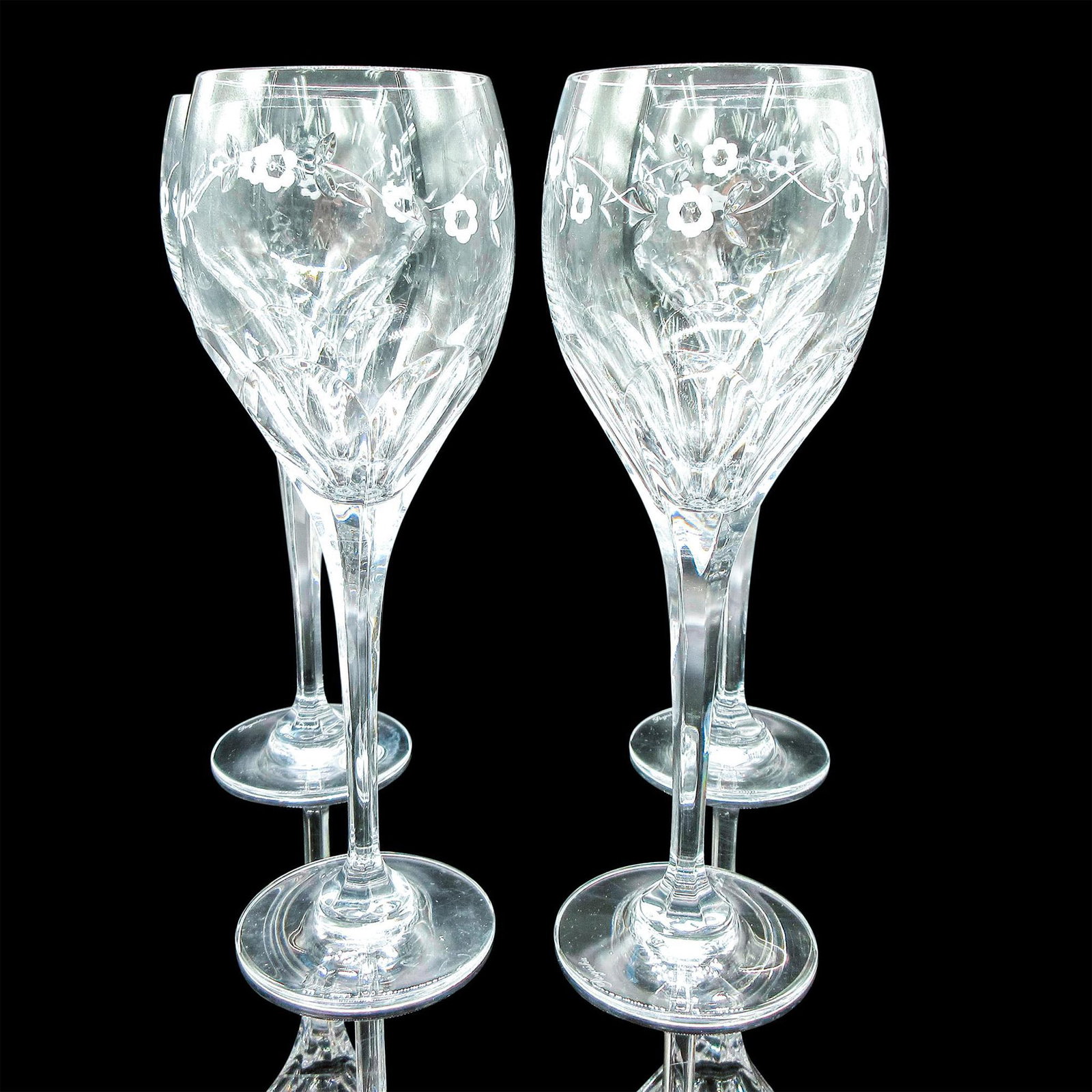 4pc Rogaska Crystal Wine Glasses, Scarlett: Beautiful floral cut design in Scarlett pattern. Long stemmed. Etched Rogaska backstamp. #Rogaska Issued: 20th c. Dimensions: 10"H Manufacturer: Rogaska Country of Origin: Slovenia