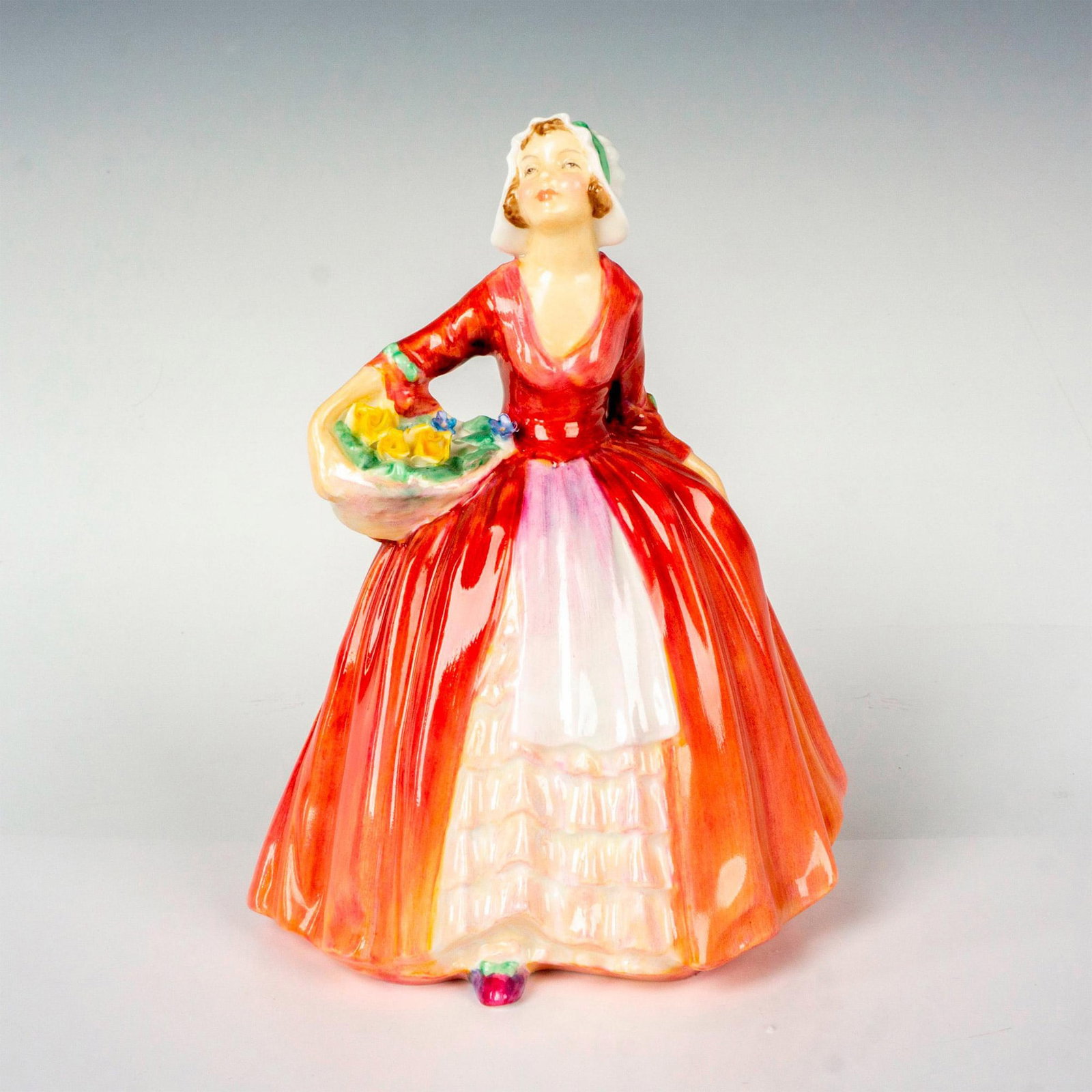 Janet - HN1537 - Royal Doulton Figurine: Artist: Leslie Harradine Issued: 1932 - 1995 Dimensions: 6.25"H Manufacturer: Royal Doulton Country of Origin: England
