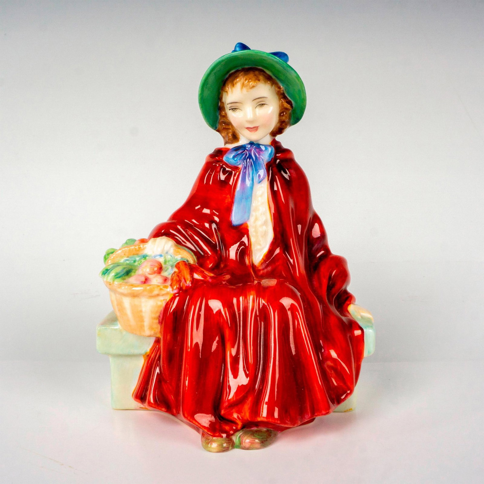 Linda - HN2106 - Royal Doulton Figurine: Artist: Leslie Harradine Issued: 1953 - 1976 Dimensions: 4.75"H Manufacturer: Royal Doulton Country of Origin: England