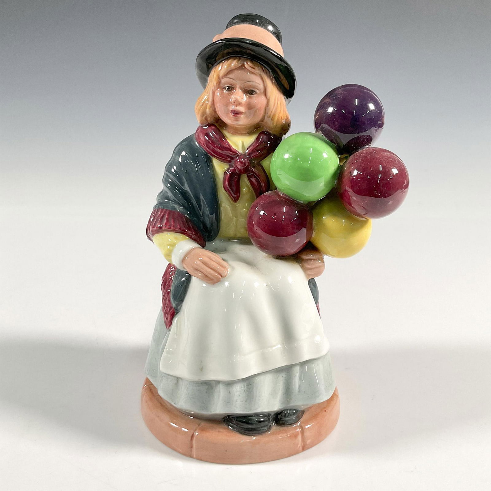 Balloon Girl - HN2818 - Royal Doulton Figurine: Artist: William K. Harper Issued: 1982 - 1977 Dimensions: 6.5"H Manufacturer: Royal Doulton Country of Origin: England