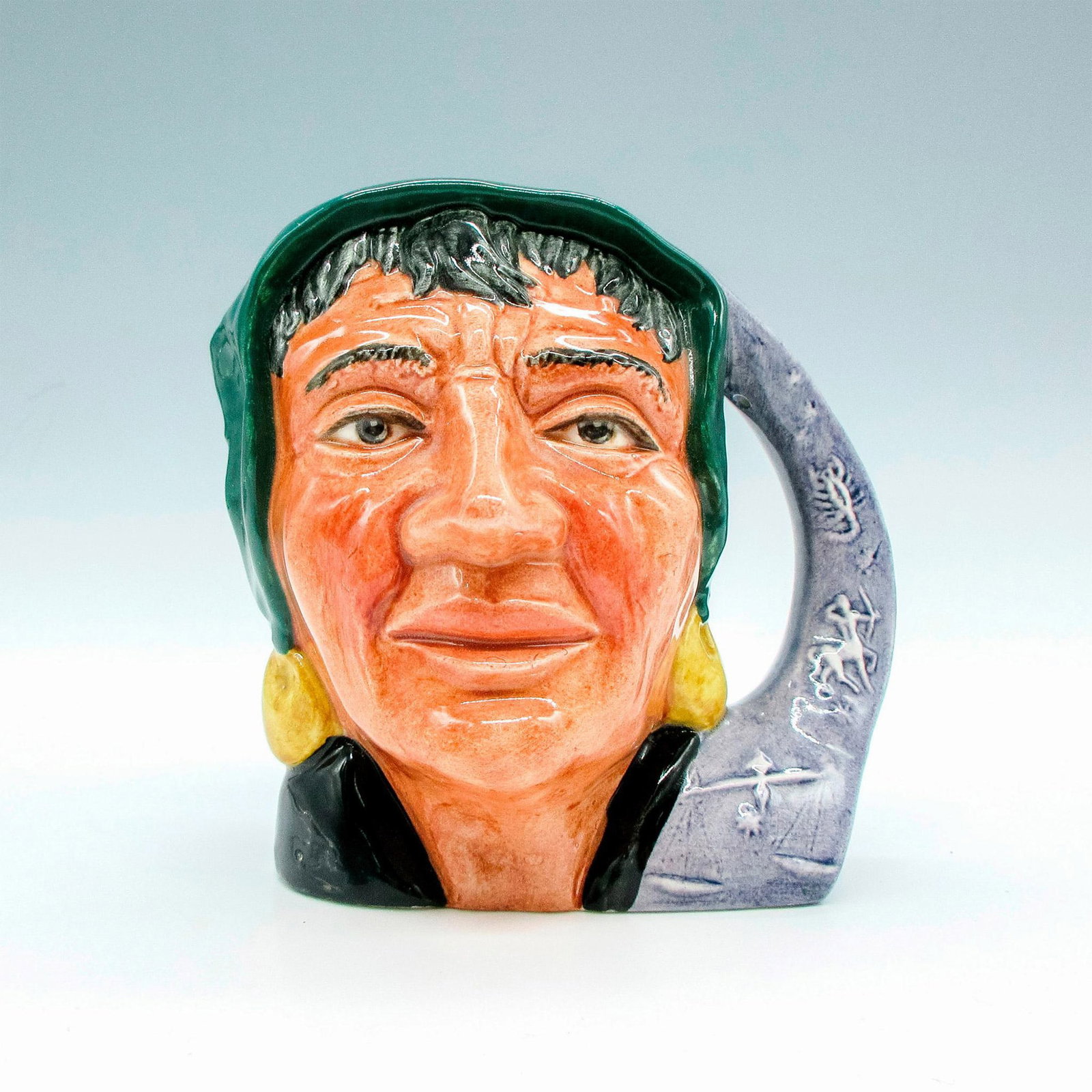 Fortune Teller D6503 - Small - Royal Doulton Character Jug: Style One, signs of the zodiac handle. Green scarf around head; black shawl; purple handle. Royal Doulton backstamp. Artist: Garry Sharpe Issued: 1959 - 1967 Dimensions: 3.75"H Manufacturer: Royal Dou