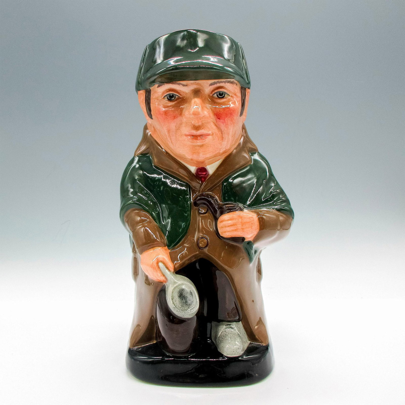 Sherlock Holmes D6661 - Royal Doulton Toby Jug: Artist: Robert Tabenor Issued: 1981-1991 Dimensions: 6"L x 4.25"W x 9"H Manufacturer: Royal Doulton Country of Origin: England