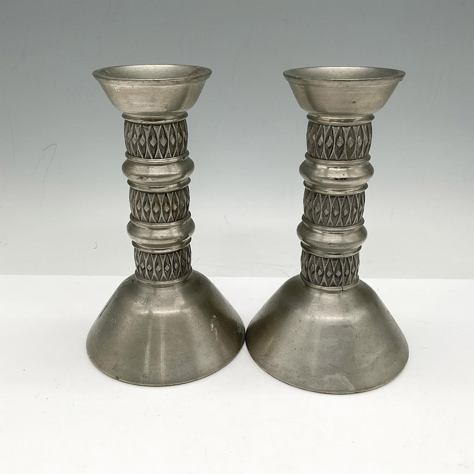 Pair of Amistad Pewter Candlestick Holders (1 of 3)