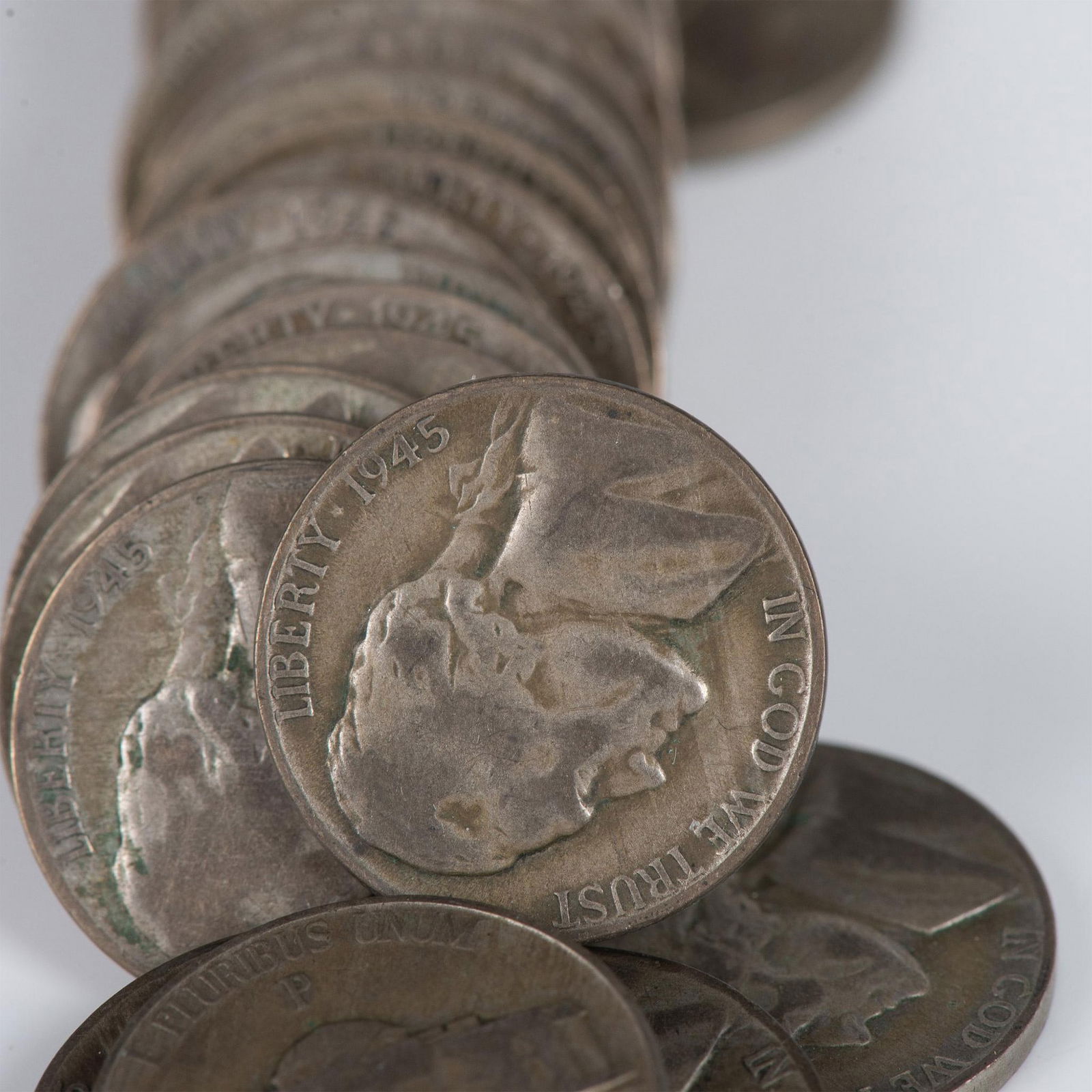 5 ROLLS OF US SILVER WWII NICKELS (40 PER ROLL): Five rolls of US Silver Nickels from the WWII Era. There are 40 Silver Nickels per Roll. Issued: 1940s Country of Origin: United Sates