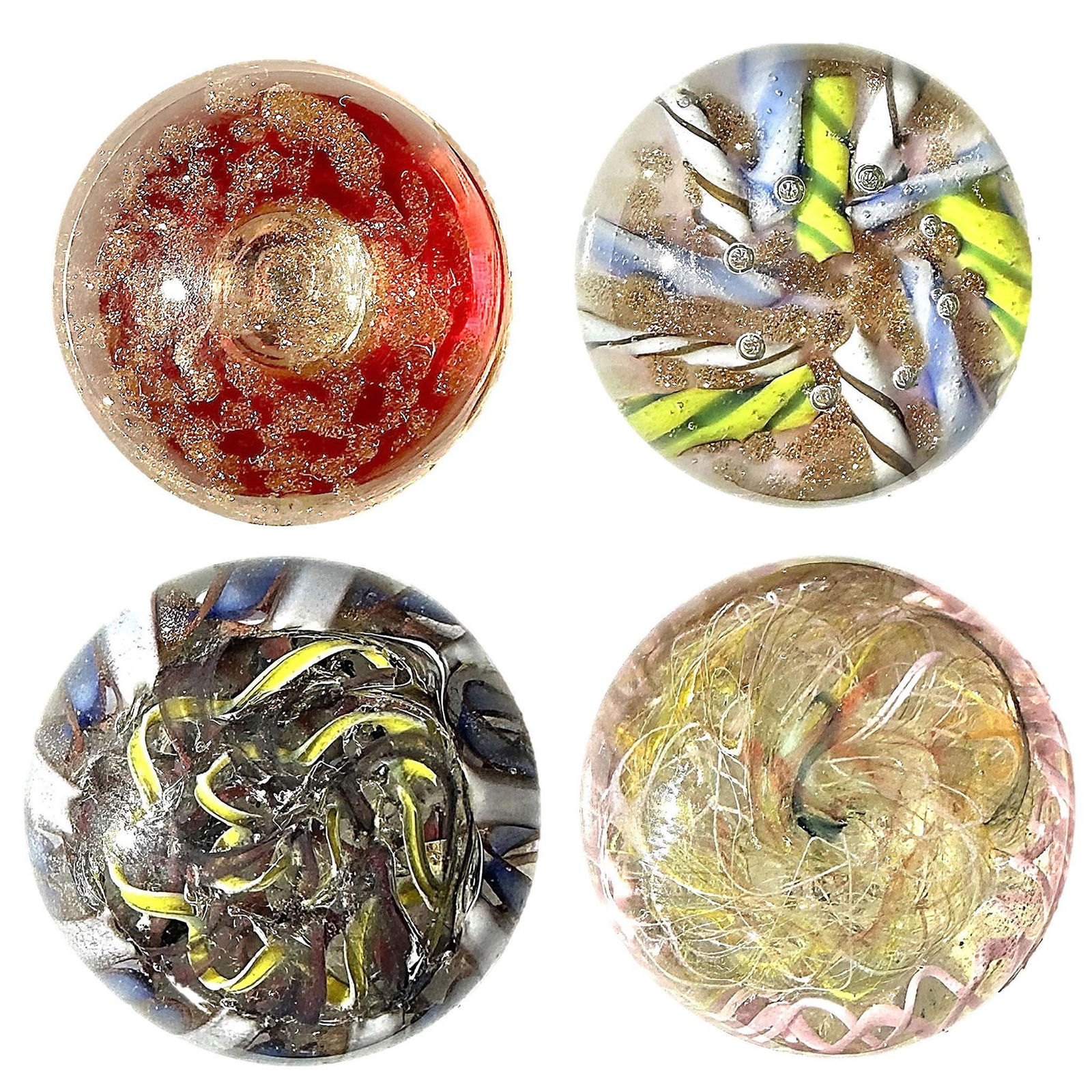 A small card of division three paperweight buttons (1 of 6)