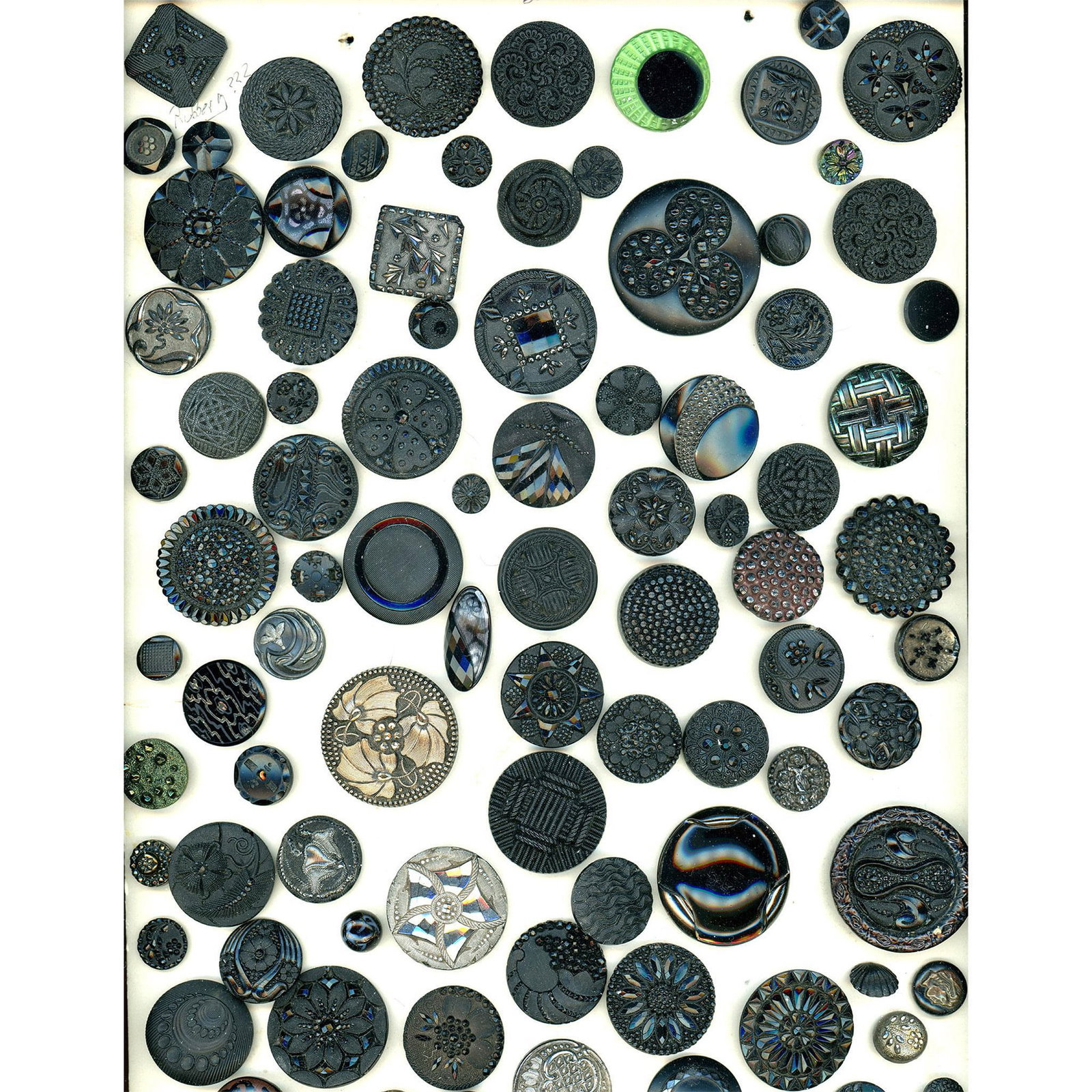 A card of division one and three black glass buttons (1 of 4)