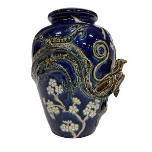 Doulton Lambeth Mary Ann Thomson Stoneware Vase: Attributed to Mark V. Marshall. A stunning cobalt glazed ovoid form vase beautifully decorated with incised white cherry blossoms, and entwined with a high relief dragon in impressive details. Doulton