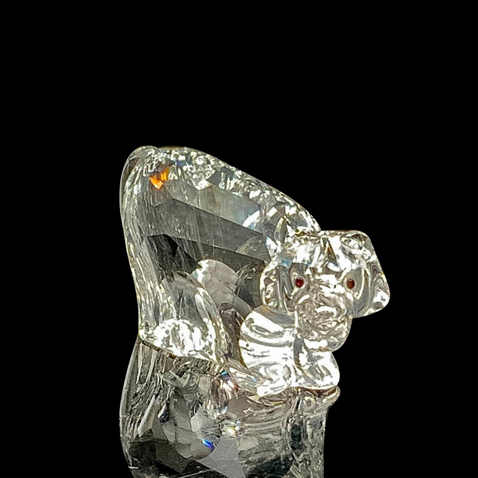 Swarovski Crystal Figurine, Zodiac Tiger 622844: This retired tiger figurine was part of the Chinese Zodiacs collection and is made from clear faceted crystal. Swarovski acid mark on the bottom. The box measures 3.25"dia. x 4.75"H. Issued: 2003-2005
