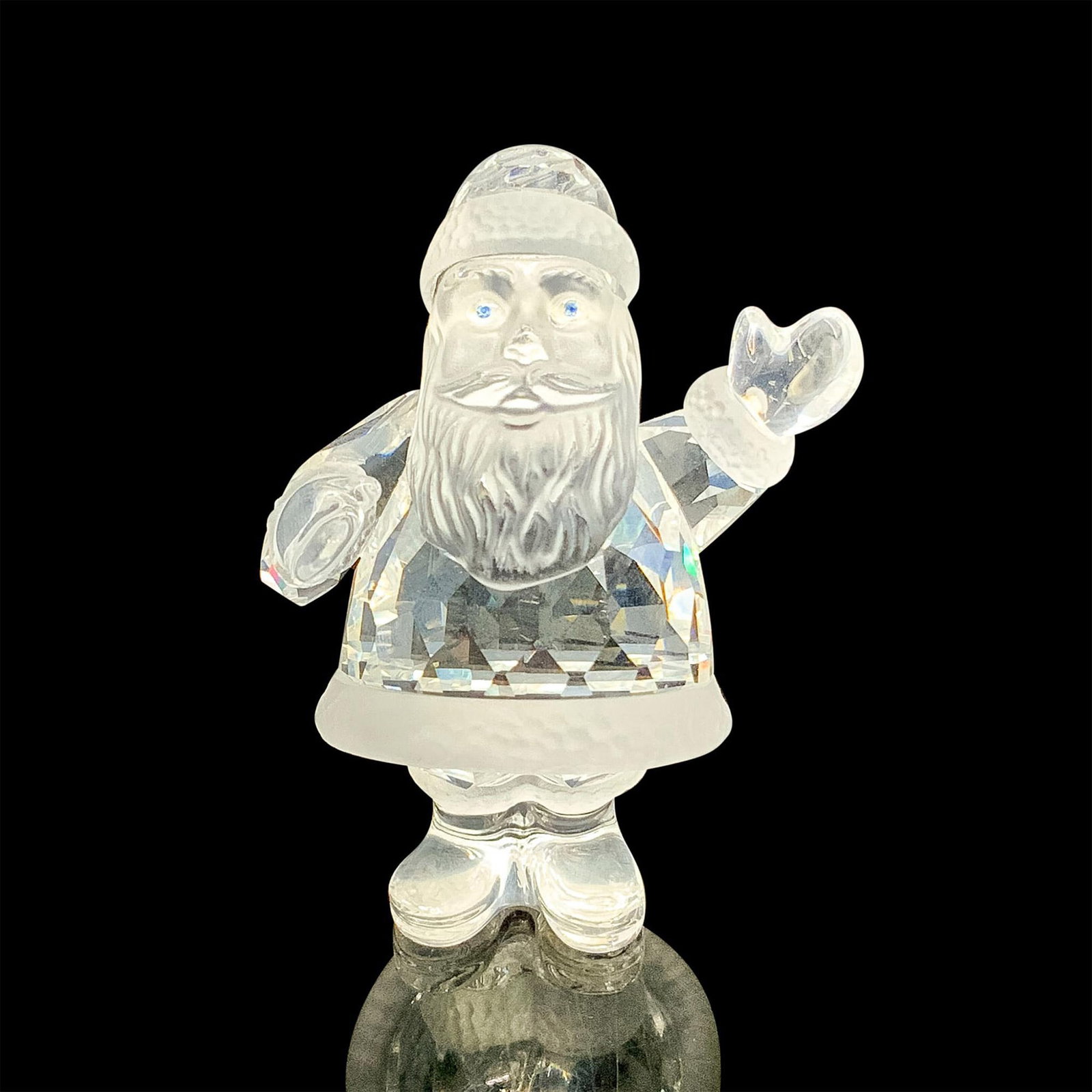 Swarovski Crystal Figurine, Santa Claus 221362: This retired Swarovski crystal Santa Claus was part of the Exquisite Accents collection and is made from faceted clear and frosted crystal. Swarovski acid stamp on bottom. Item has it's original bot w