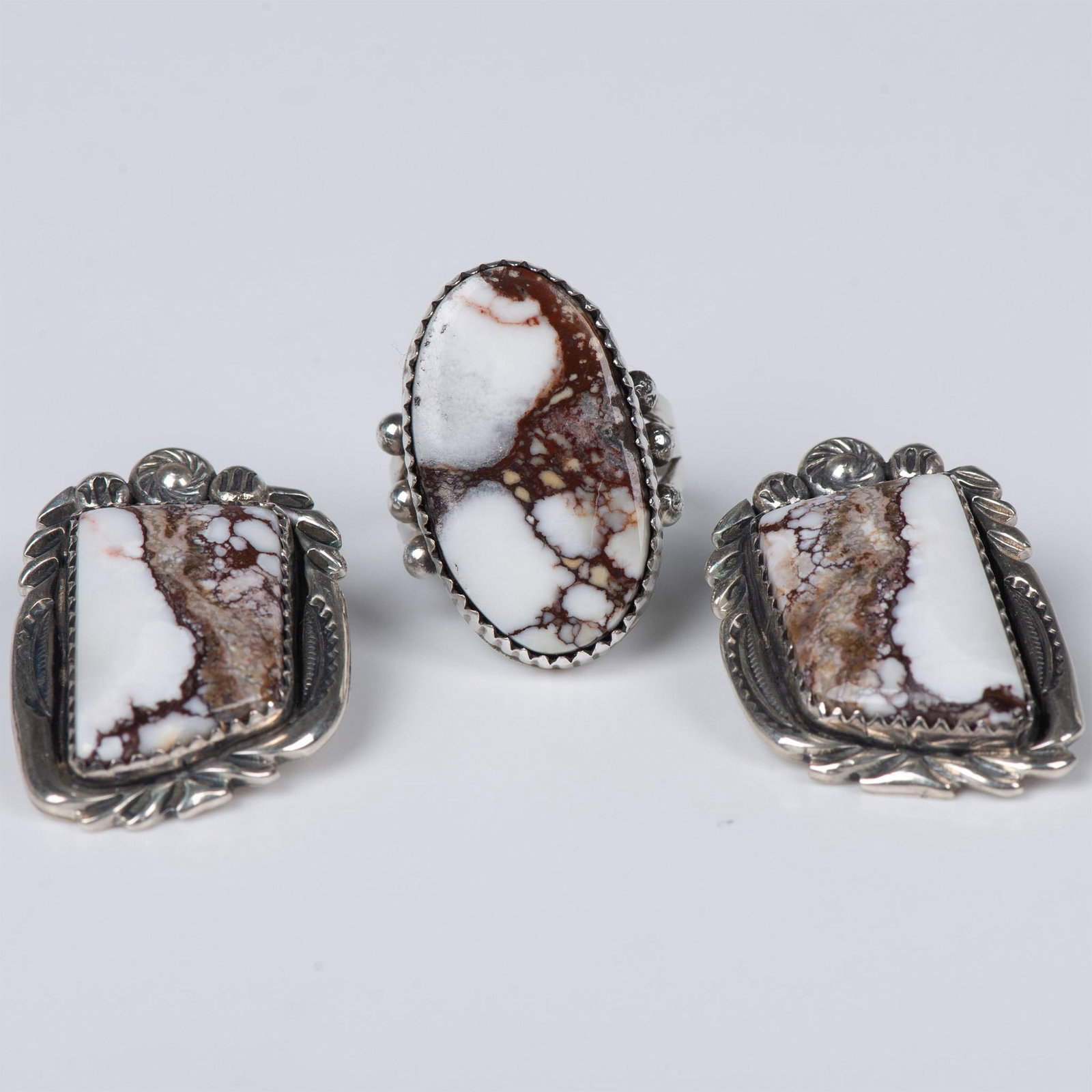 3pc Sterling Silver and Jasper Ring and Earrings: Beautiful wild horse jasper picture frame clip earrings. The sterling silver scroll work surrounding the crisp white and brown stone is lovely. The shape is unique. The jasper ring coordinates and is 