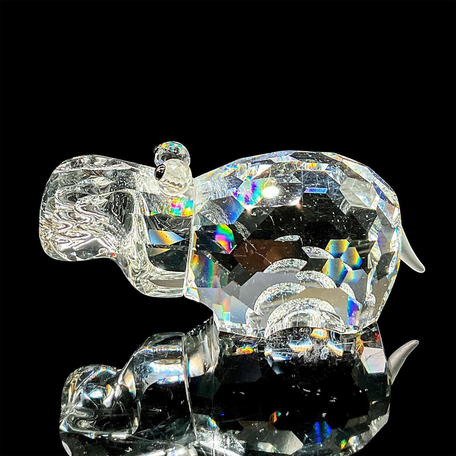Swarovski Silver Crystal Figurine, Hippo: Clear faceted crystal figure of a standing mighty hippopotamus. Item number 7626NR65. Retired. Part of the African Wildlife collection. Swarovski mark. This item has its original box: 5"H x 3.25" dia.