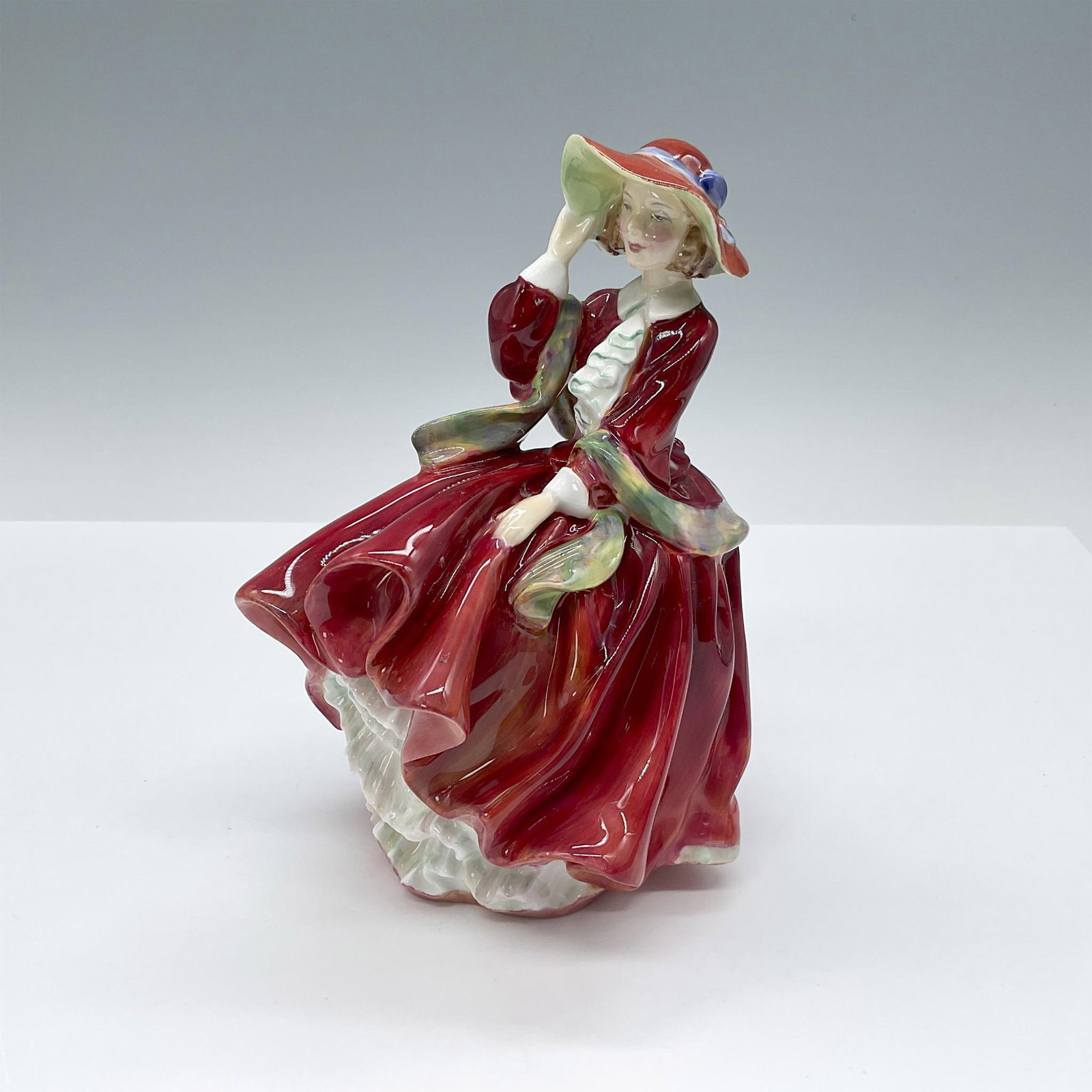 Top O' The Hill - HN1834 - Royal Doulton Figurine: Artist: Leslie Harradine Issued: 1937 - 2004 Dimensions: 7"H Manufacturer: Royal Doulton Country of Origin: England