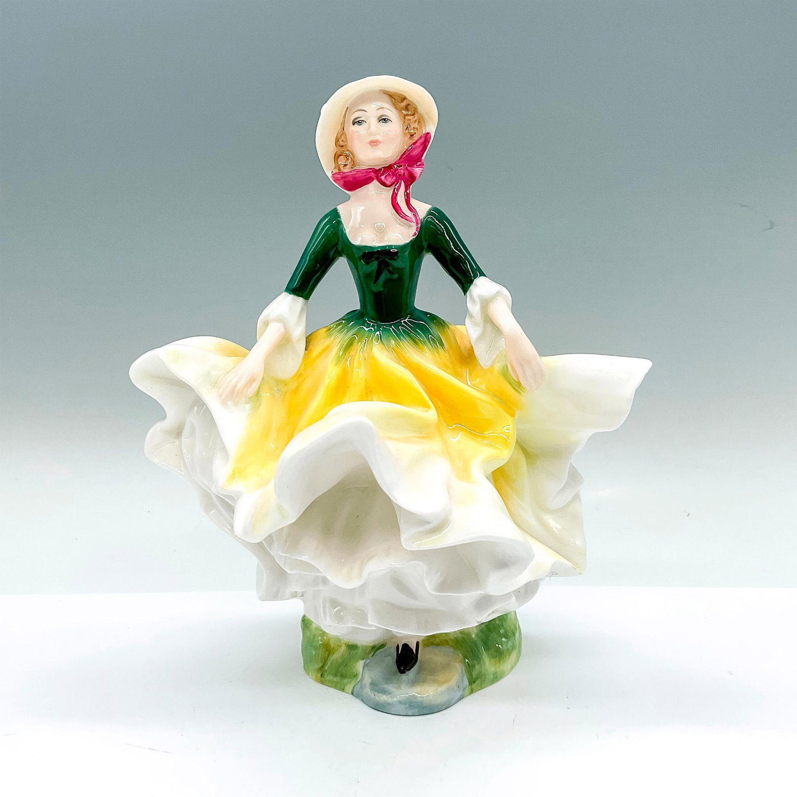 Becky - HN2740 - Royal Doulton Figurine: Artist: Douglas V. Tootle Issued: 1987 - 1992 Dimensions: 8"H Manufacturer: Royal Doulton Country of Origin: England