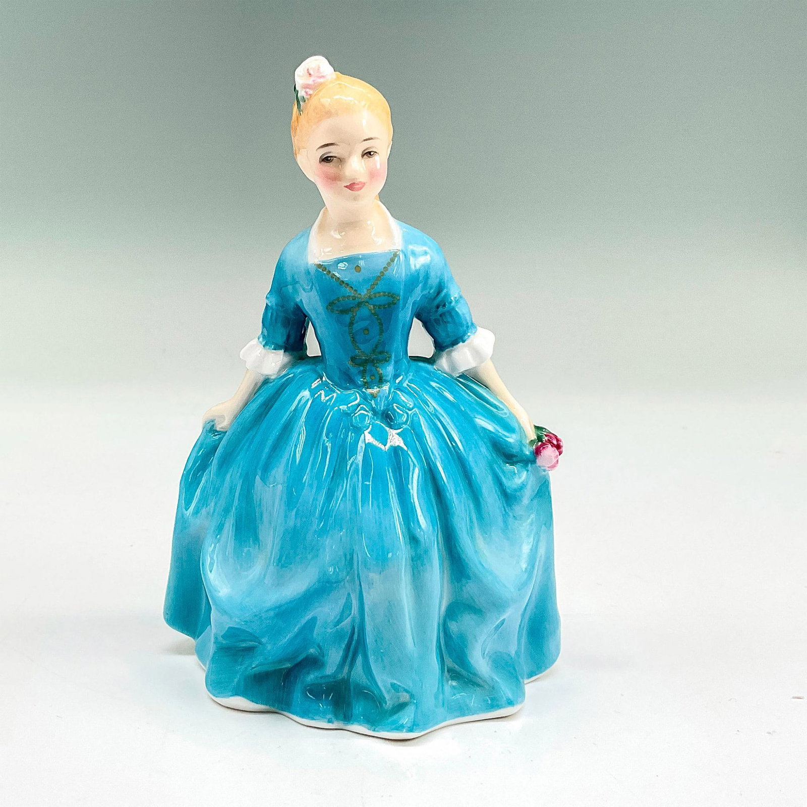 Child from Williamsburg - HN2154 - Royal Doulton Figurine: Artist: Peggy Davies Issued: 1964 - 1983 Dimensions: 5.5"H Manufacturer: Royal Doulton Country of Origin: England