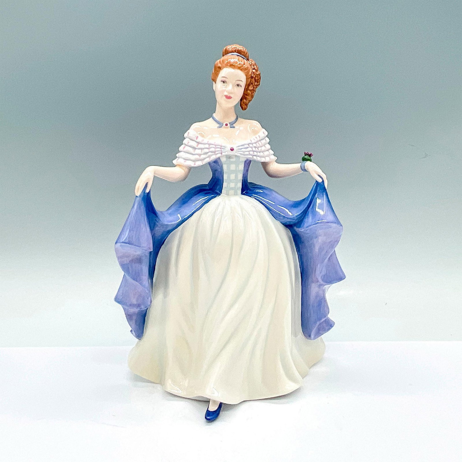 Scottish Pride - HN5030 - Royal Doulton Figurine: Artist: Nada Pedley Issued: 2007 Dimensions: 8.75"H Manufacturer: Royal Doulton Country of Origin: England