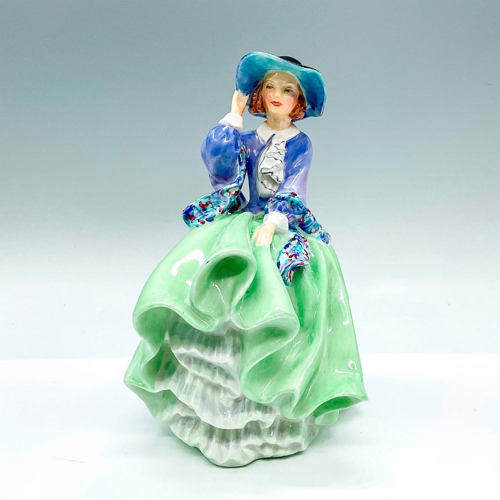 Top o' the Hill - HN1833 - Royal Doulton Figurine: Artist: Leslie Harradine Issued: 1937 - 1971 Dimensions: 7"H Manufacturer: Royal Doulton Country of Origin: England