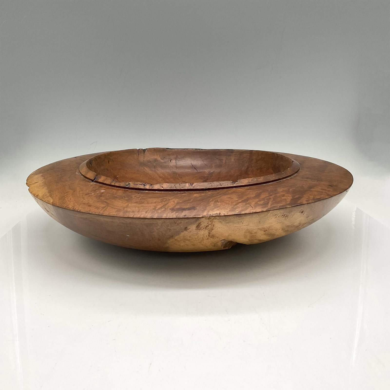 Peter Stroud Carved River Red Gum Wood Console Bowl: Medium toned wood cut and smoothed leaving natural growth and striations. Peter Stroud Sydney etched mark. Artist: Peter Stroud Dimensions: 2.75"H x 14.75" dia. Country of Origin: Australia