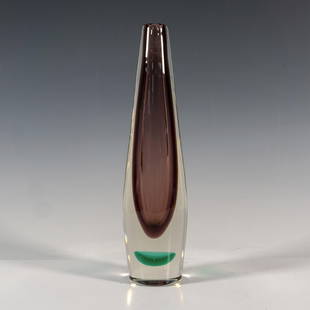 Hadeland Glassverk by Willy Johansson Glass Vase: A slender oblong vessel in clear, purple, and green colored glass. Hadeland and artist initials etched on the underside. Artist: Willy Johansson Issued: 1950s Dimensions: 2.25"W x 9.5"H