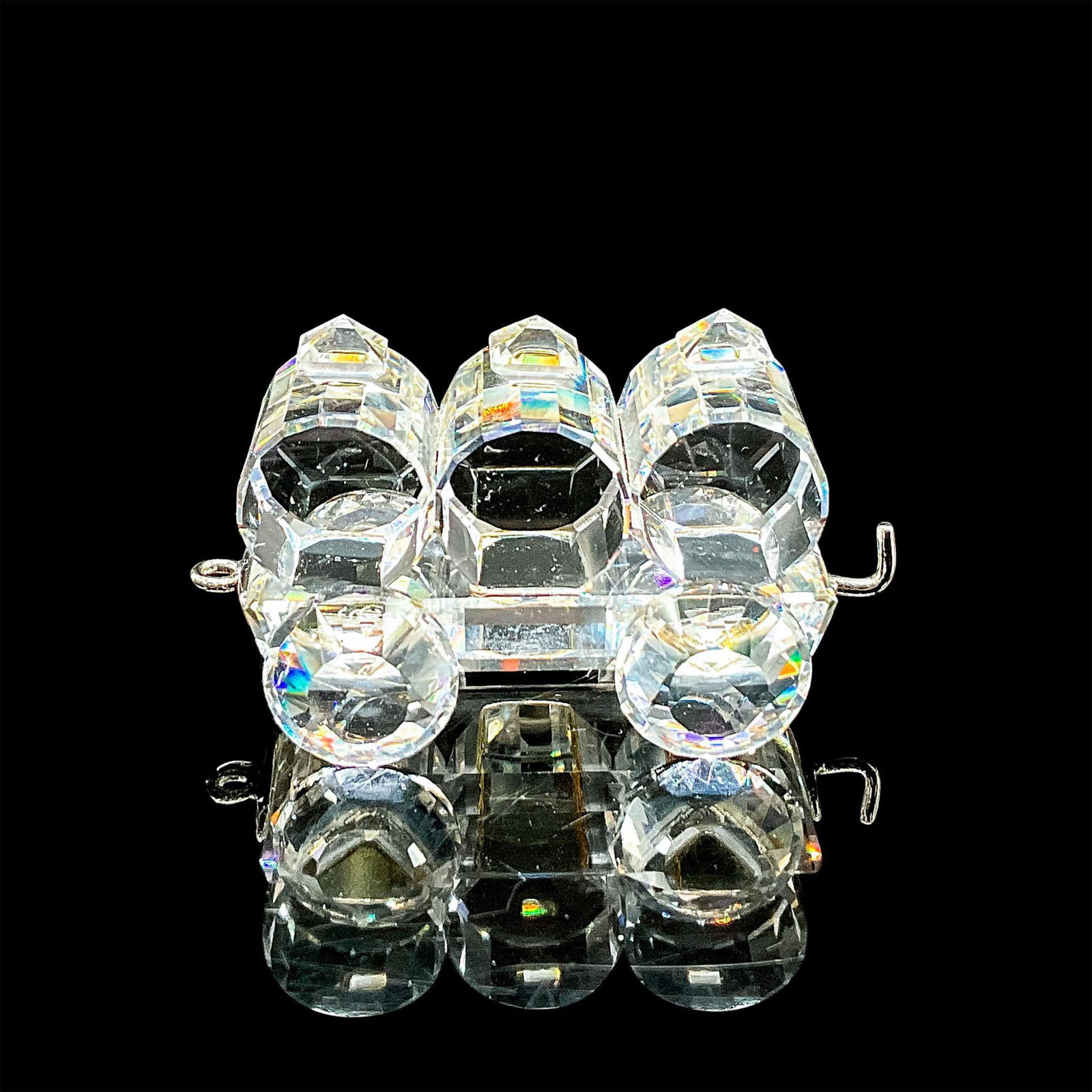 Swarovski Crystal Figurine, Petrol Wagon Train Car: Sparkling clear crystal train car. Retired. Swarovski mark. Item number 7471NR000004. This item has its original box: 3.75"H x 3.25"dia. Dimensions: 2"L x 1.25"W x 1.25"H Manufacturer: Swarovski Count