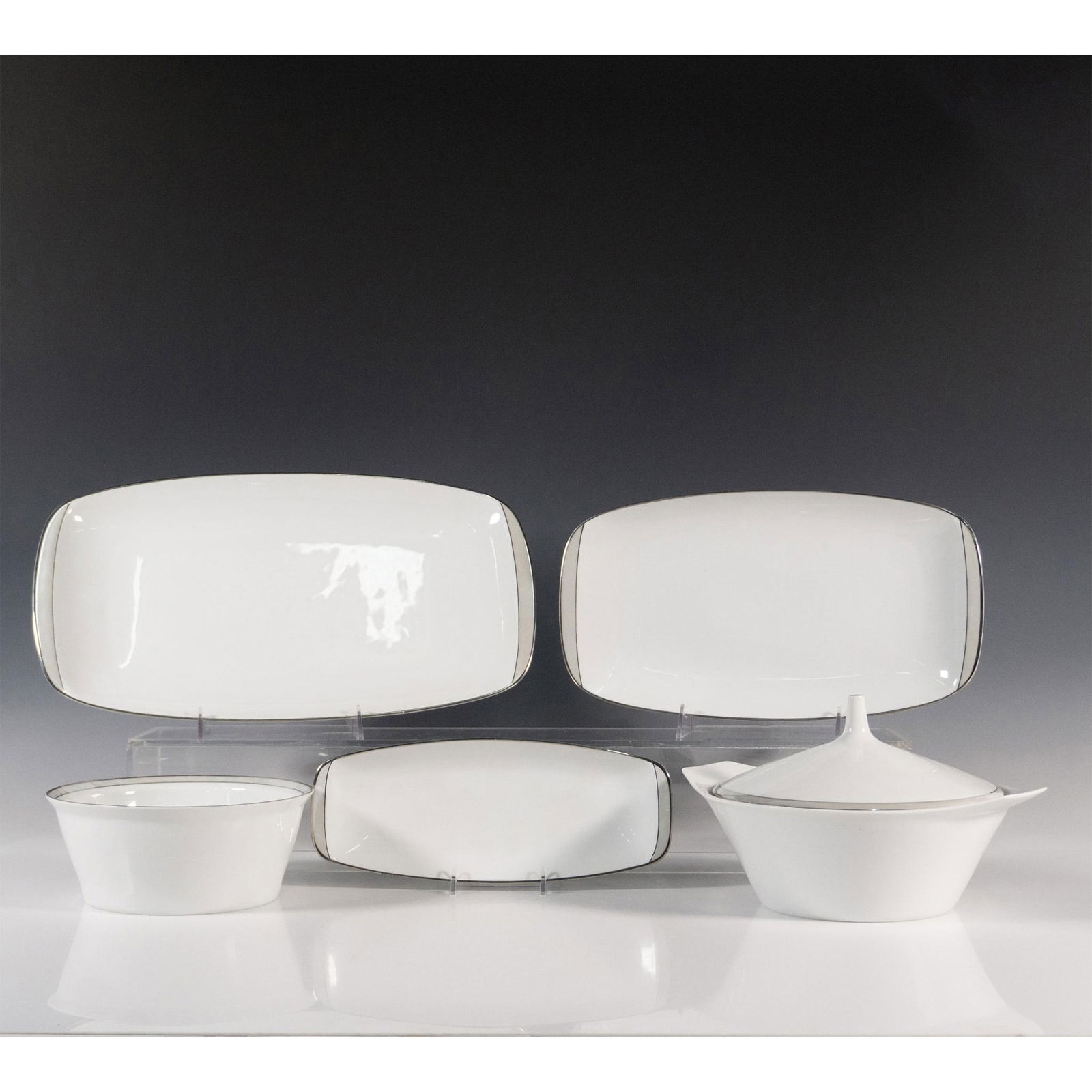 5pc Rosenthal Continental Gala Grey Serveware: Rosenthal platinum rimmed Gala Grey pieces with Rosenthal backstamps. The large platter tray measures 15.75"L x 8.5"W. The smaller platter tray measures 13.25"L x 7.25"W. The serving bowl measures 7.5