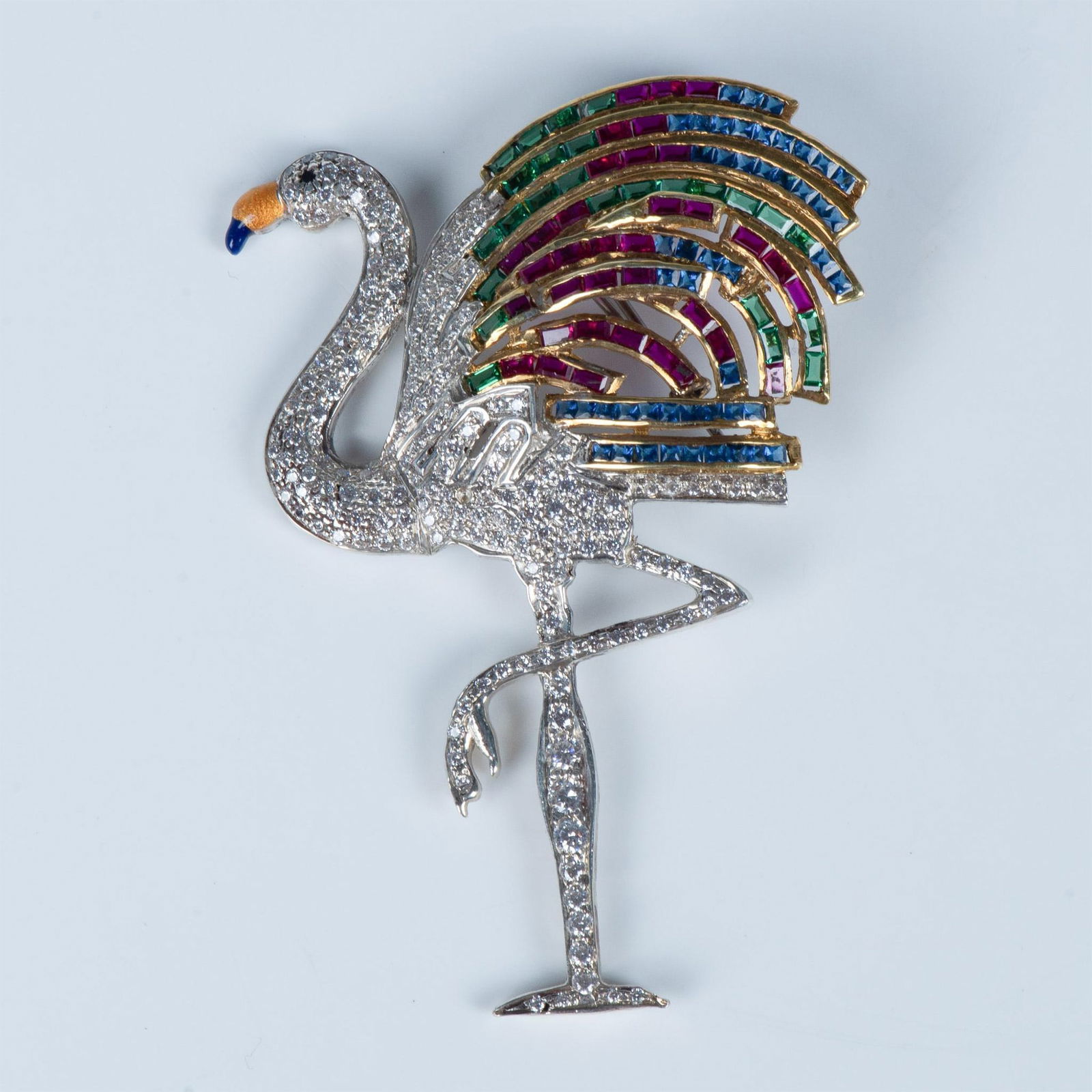 Sterling Silver and Swarovski Crystal Flamingo Brooch: This brooch is an Exact copy of Duchess of Windsor. Iconic flamingo on one leg in an array of colorful Swarovski crystals. The body is small clear crystals with a beautiful plumage of emerald, ruby an