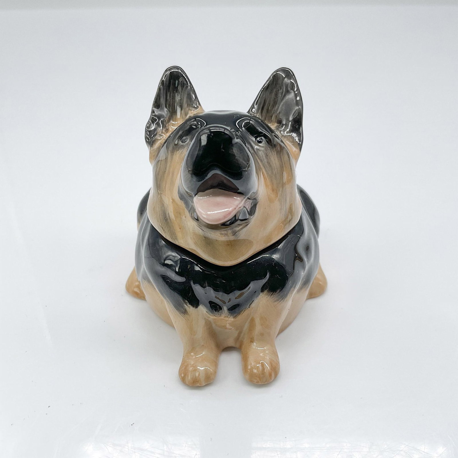Kevin Francis Dog Face Pots, Sydney the Shepard: Molded as a Shepard with the inscription inside that reads, To Watch Over Me. Gilded Kevin Francis Face Pots backstamp. Issued: 2001 Dimensions: 2.5"L x 2.75"W x 2.5"H Manufacturer: Kevin Francis Coun