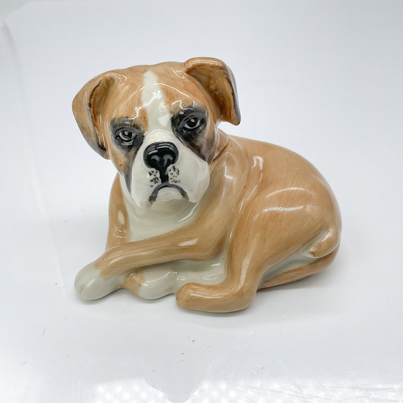 Kevin Francis Dog Face Pot, Mrey: Molded as a tan Boxer with the inscription inside reading, Who's a Good Boy! Kevin Francis Face Pots backstamp. Issued: 2004 Dimensions: 3"L x 2.5"W x 2.5"H Edition Number: 19 of 225 Manufacturer: Kev