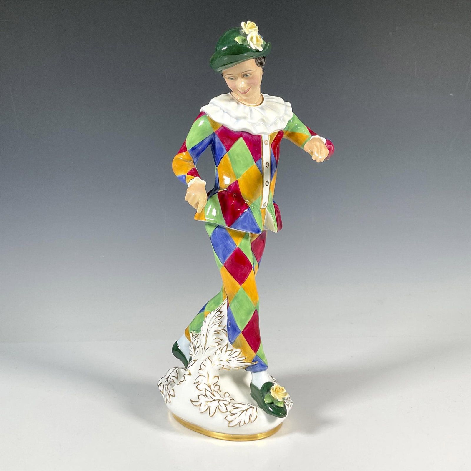 Harlequin - HN2737 - Royal Doulton Figurine: Artist: Douglas V. Tootle Issued: 1982 - 2009 Dimensions: 12.5"H Manufacturer: Royal Doulton Country of Origin: England