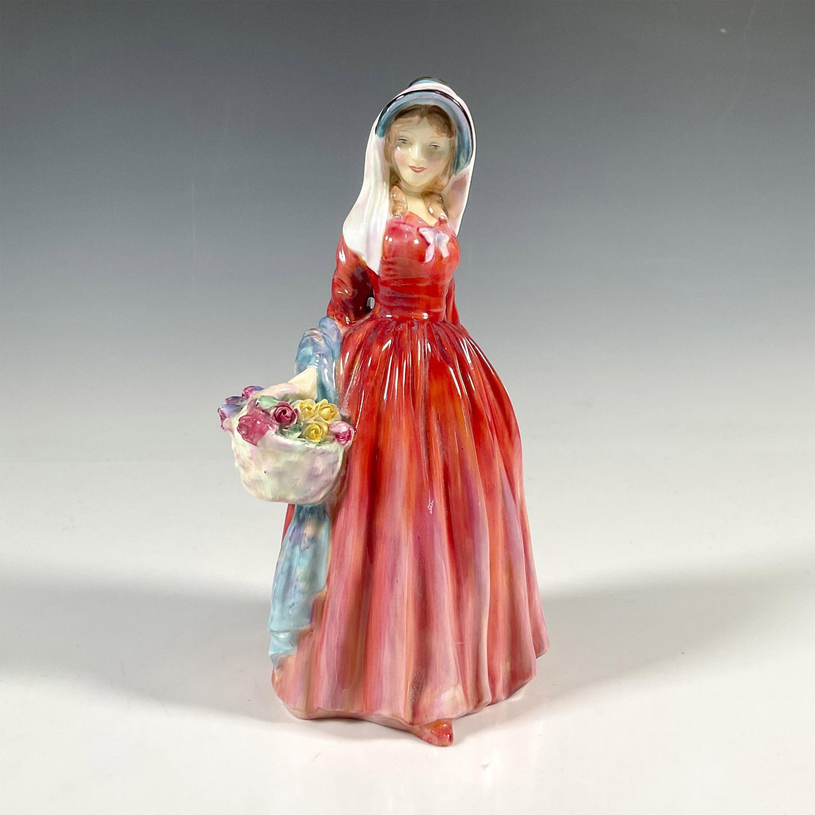 Rosemary HN2091 - Royal Doulton Figurine: Artist: Leslie Harradine Issued: 1952 - 1959 Dimensions: 7"H Manufacturer: Royal Doulton Country of Origin: England
