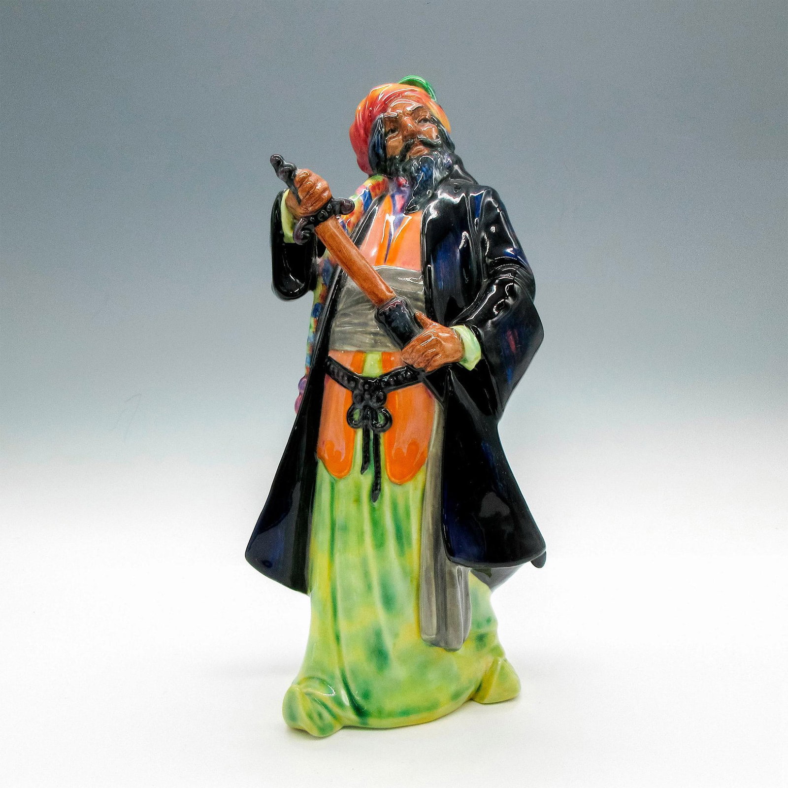 Bluebeard HN2105 - Royal Doulton Figurine: Glossy finish. Royal Doulton backstamp. Artist: Leslie Harradine Issued: 1953 - 1992 Dimensions: 11"H Manufacturer: Royal Doulton Country of Origin: England