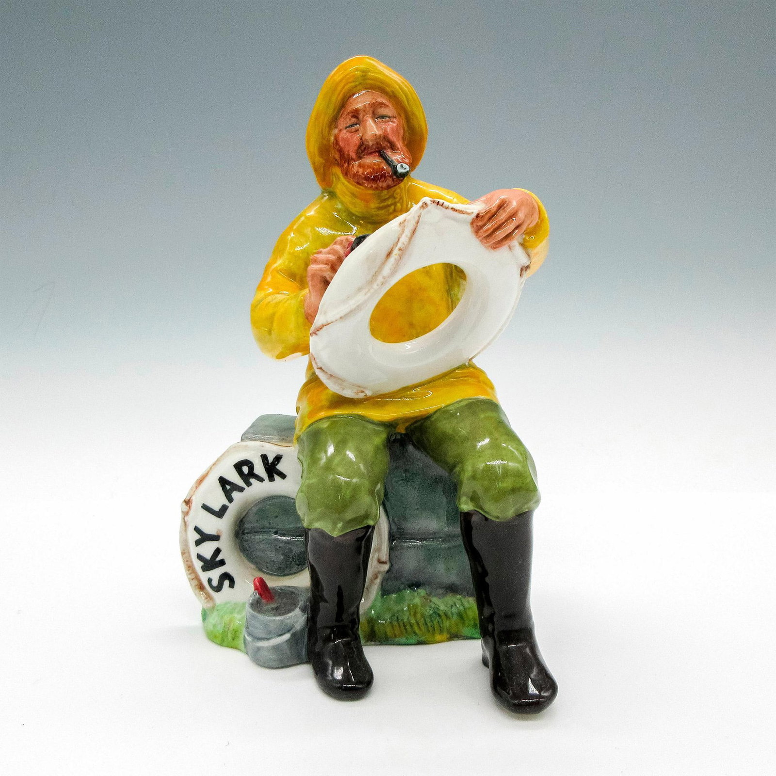 Boatman (Skylark) HN2417 - Royal Doulton Figurine: Glossy finish. Royal Doulton backstamp. Artist: Mary Nicoll Issued: 1971 - 1987 Dimensions: 6.5"H Manufacturer: Royal Doulton Country of Origin: England