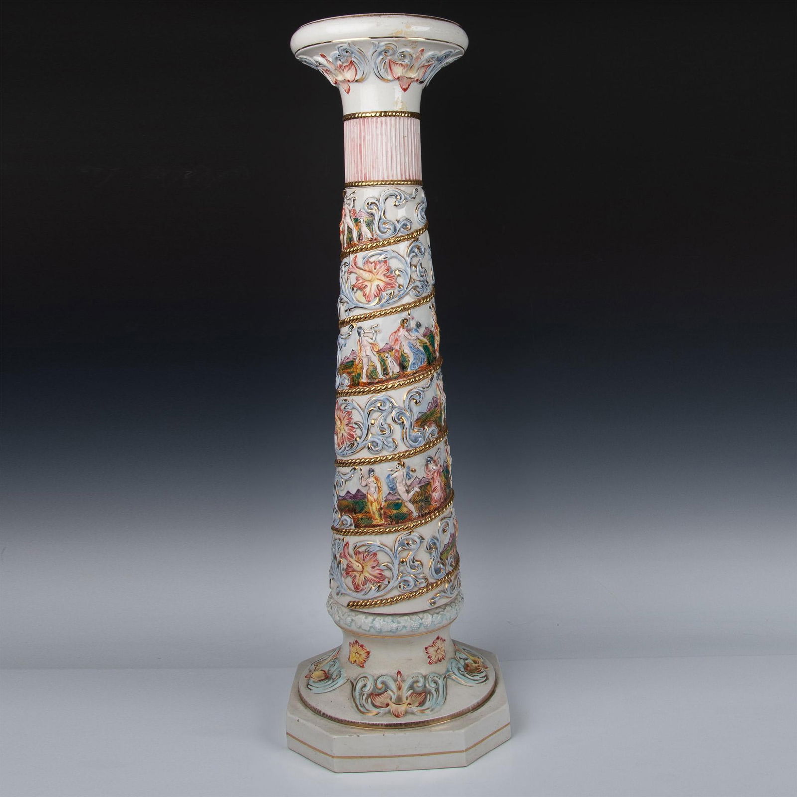 Capodimonte Porcelain Large Pedestal: Elaborate porcelain, designed in intricate pastel-colored scenes reminiscent of mythological themes, separated by golden bands. The top and bottom of the column are bordered with gold-trimmed detailin