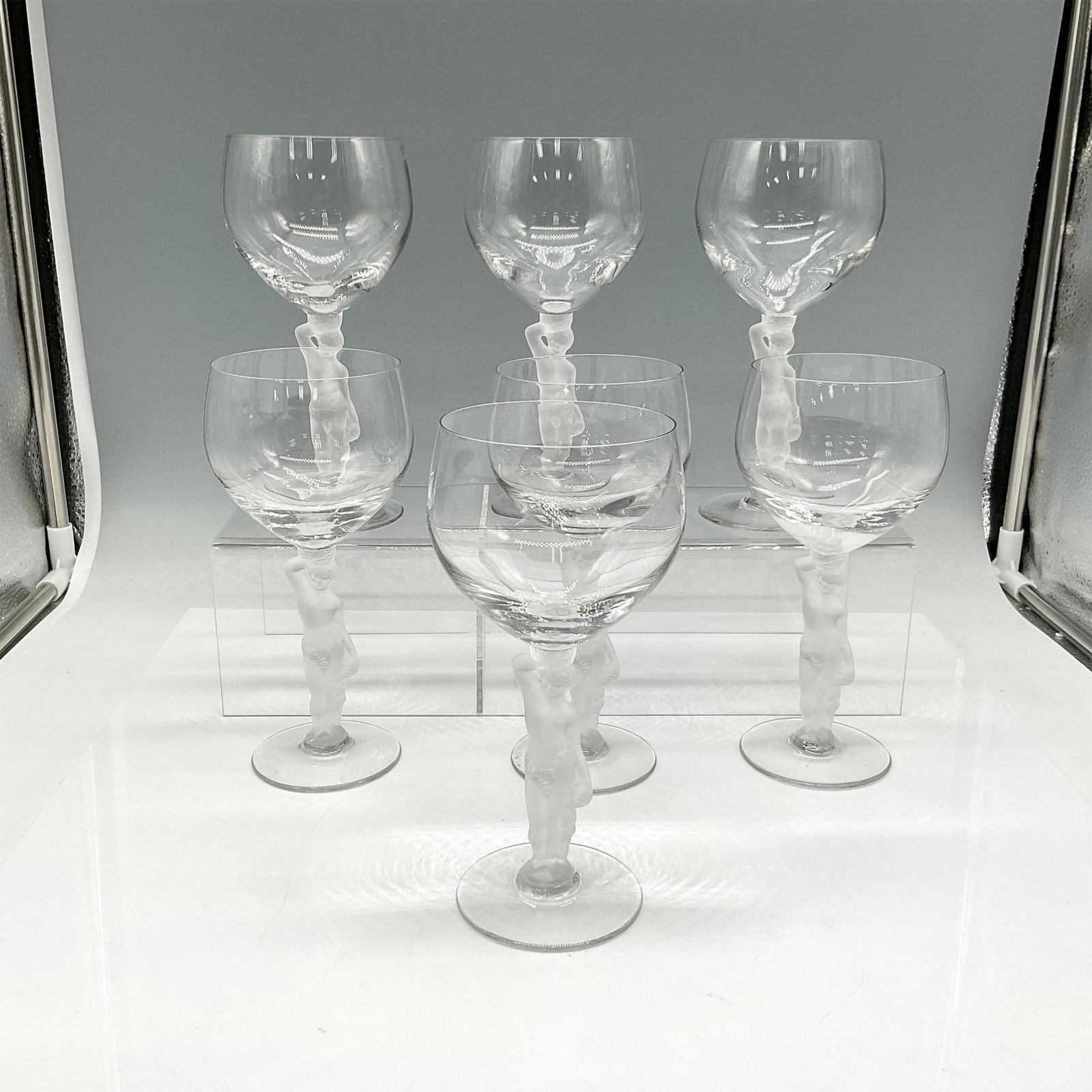 7pc Vintage Bayel Bacchus Crystal Frosted Male Nude Goblets: Collection of seven clear fine crystal globe glasses with molded and frosted crystal male nude figural stem. Issued: c. 1960 Dimensions: 7.5"H x 3.5" dia. Manufacturer: Bayel Bacchus