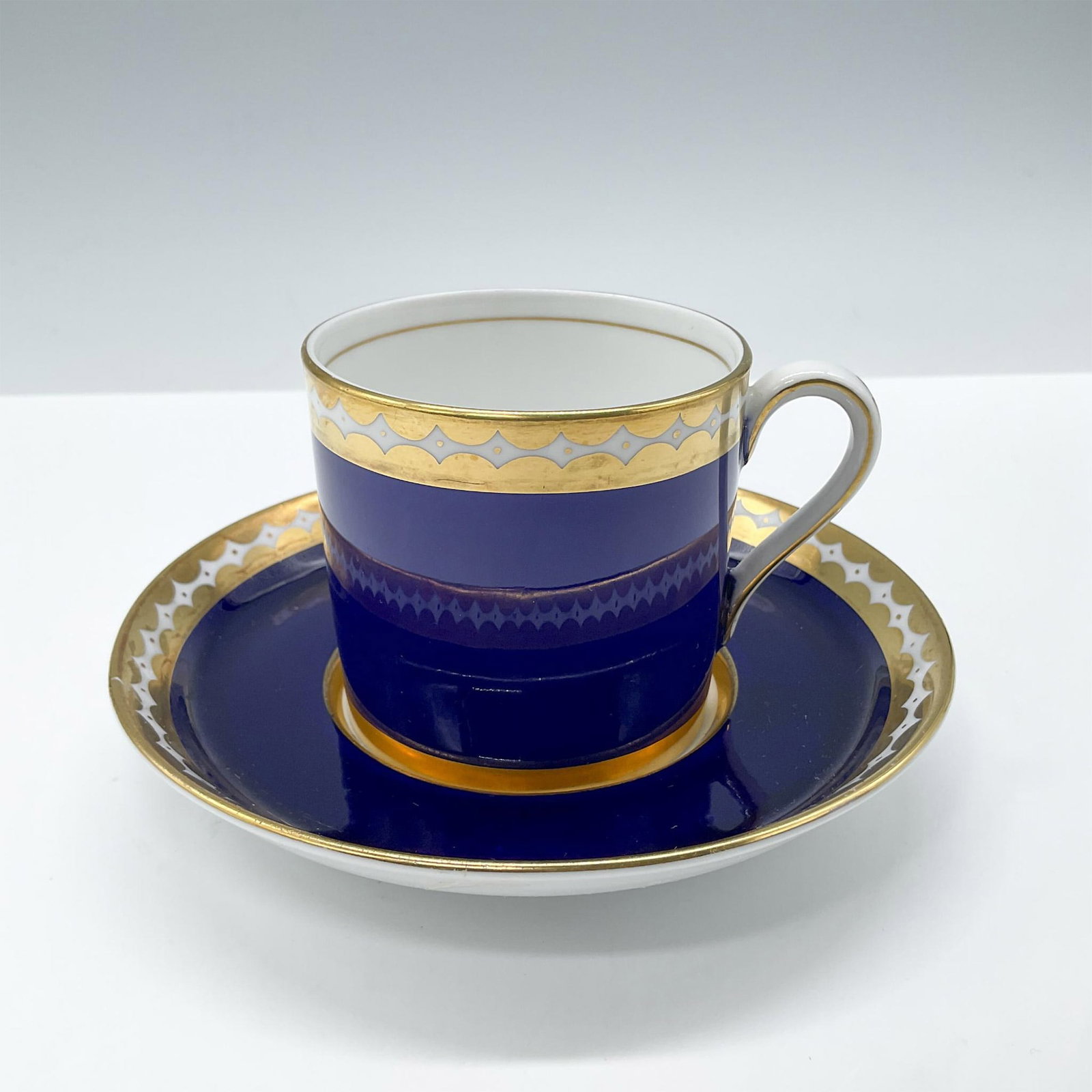 Antique Tiffany & Co Grosvernor Bone China Cup and Saucer: Beautiful fine Bone China set. Grosvenor China was a British company that produced bone china from 1899 to 1966, they partnered with Tiffany & Co to produce this beautiful set that features a deep blu