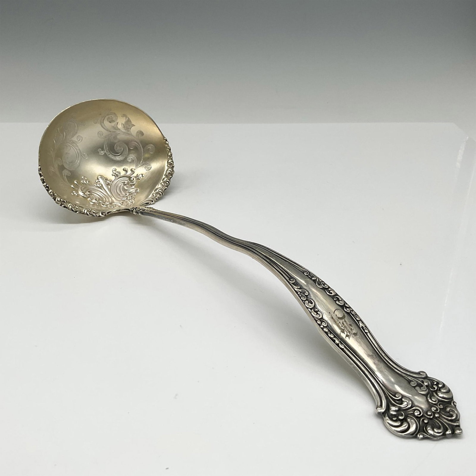 1847 Rogers Brothers A1 Silver Plate Soup Ladle: Ornate design on handle and bowl of ladle. 1847 Rogers Bros A1 impressed mark. Issued: 20th century Dimensions: 11"L x 3.5"W x 3"H Manufacturer: Rogers Brothers Country of Origin: United States