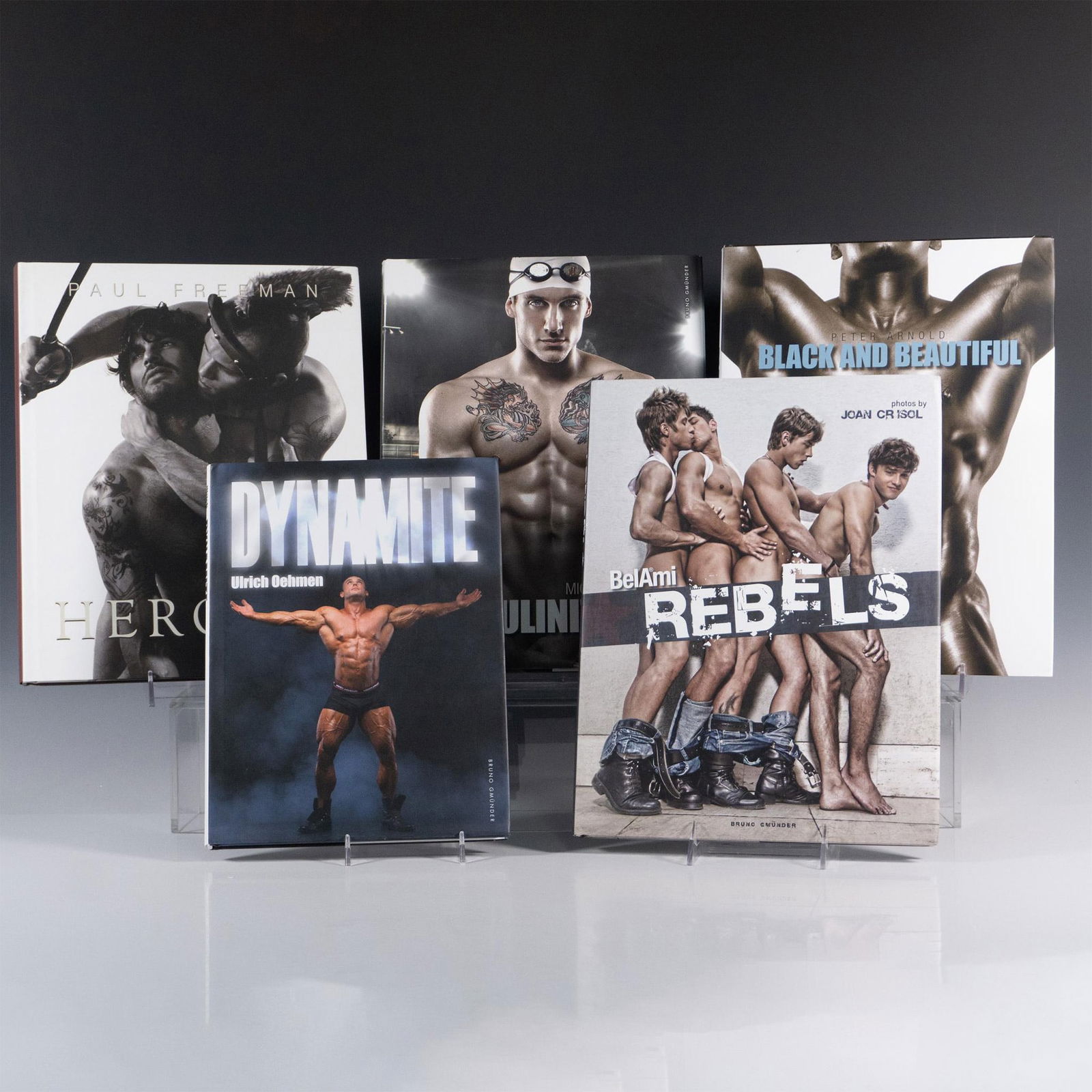 5 Books of Male Erotic Photography: 5 colored, and black and white photography books depicting the male masculinity in an artistic perspective. Titles includes Heroics (Paul Freeman, 2011), Masculinity (Michael Stokes, 2012), Black and