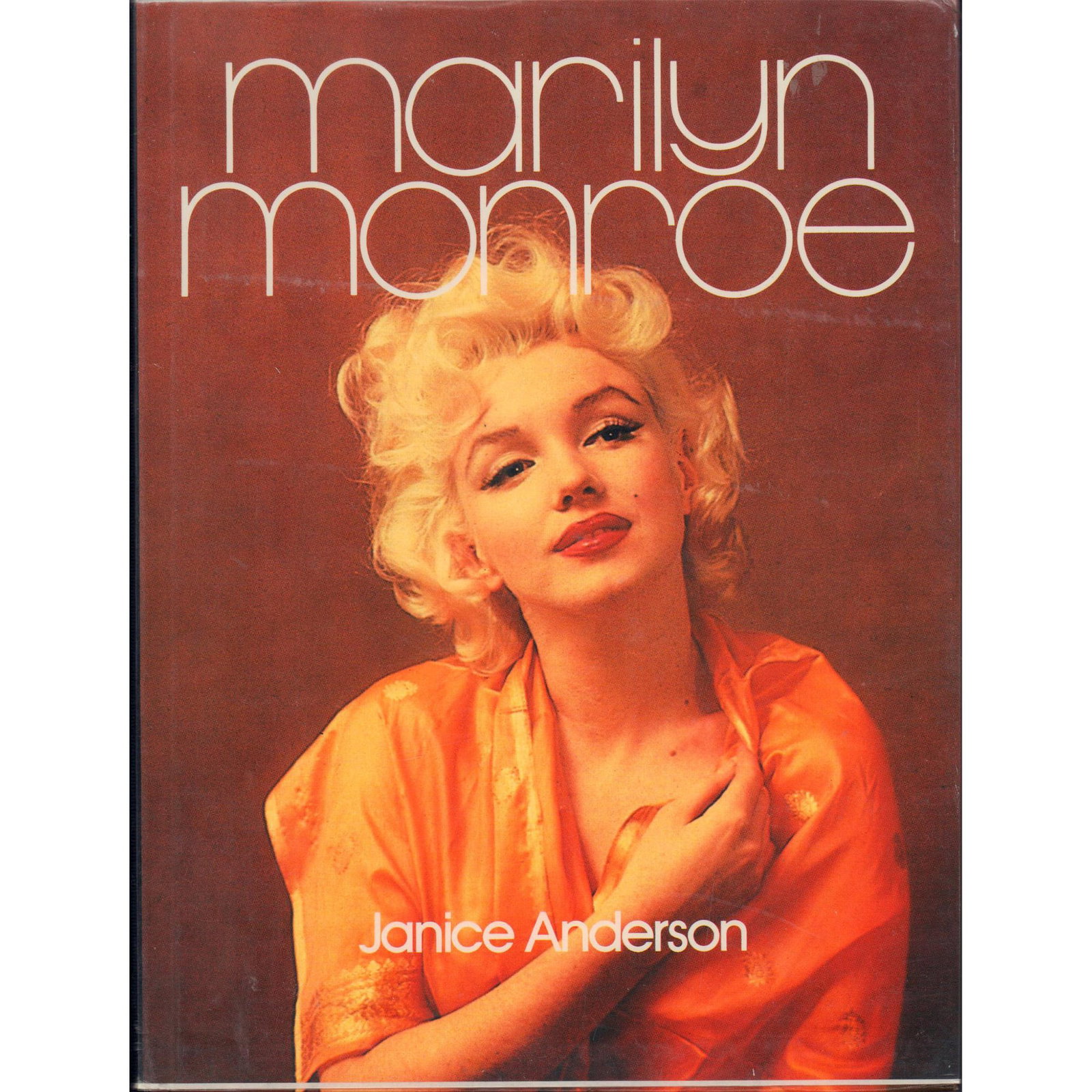 Hardcover Book, Marilyn Monroe: Featuring a wealth of film stills and photographs of her off-screen life, and portrays the achievements of a great movie star who is still a famous figure and one of the all-time goddesses of Hollywoo
