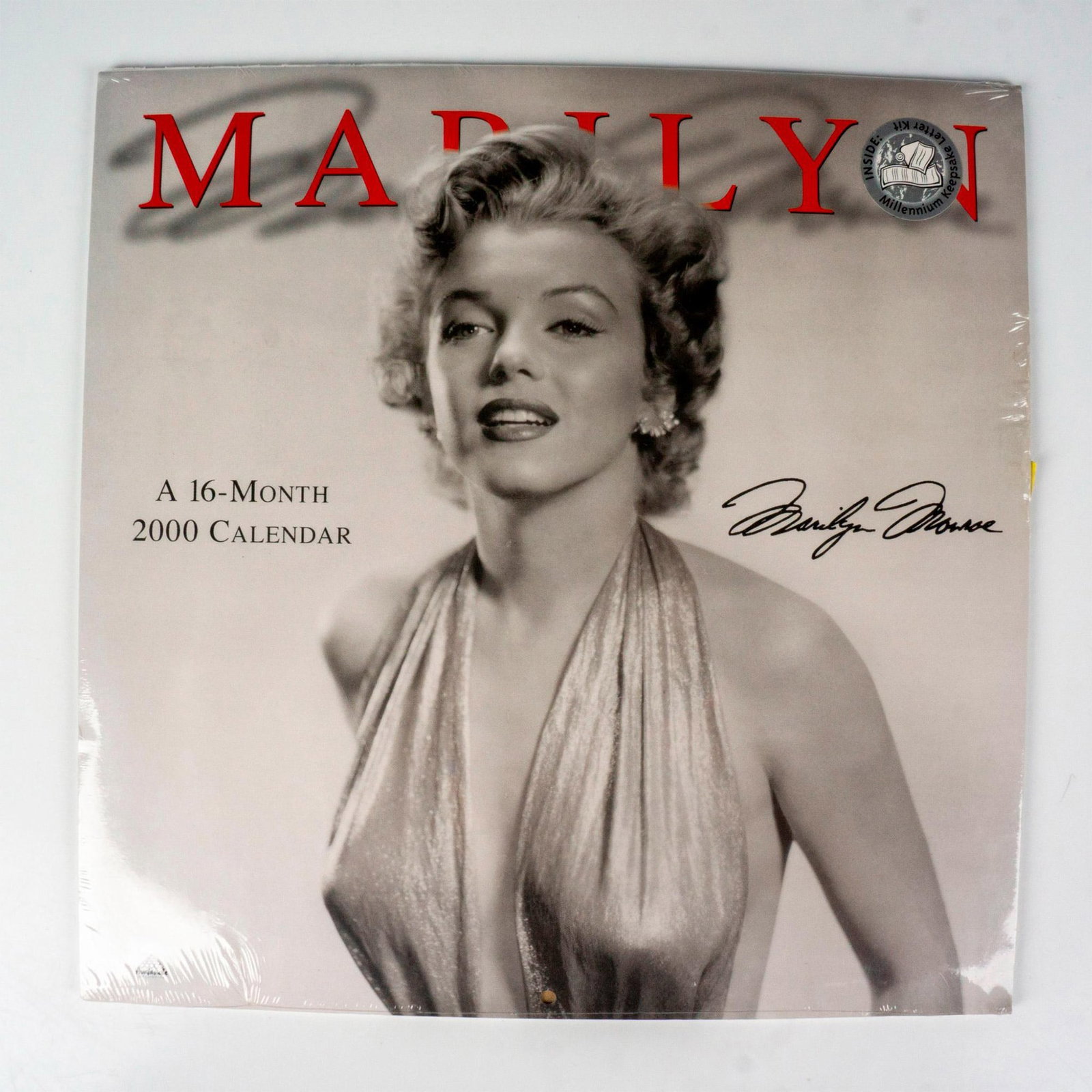 Collectible Avalanche Publishing Calendar, Marilyn 2000: Sixteen month calendar depicting black and white photographs of the iconic American actress and beauty Marilyn Monroe. Includes millennium keepsake letter kit inside. Avalanche Publishing printed to f