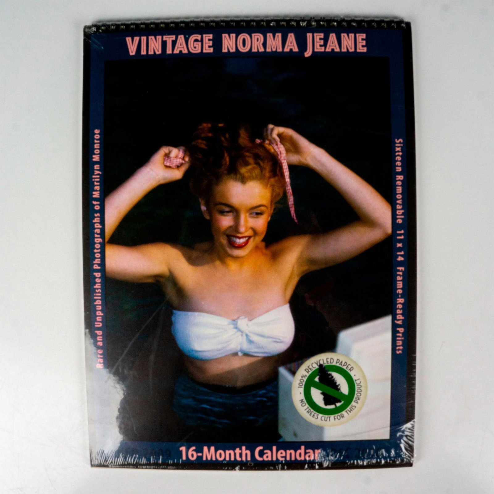 Asgard Press Collectible Calendar, Vintage Norma Jean 2010: Sixteen month calendar with rare and unpublished color photographs of a classic girl next door beauty named Norma Jeane, later known as American actress Marilyn Monroe. Images are perforated and frame