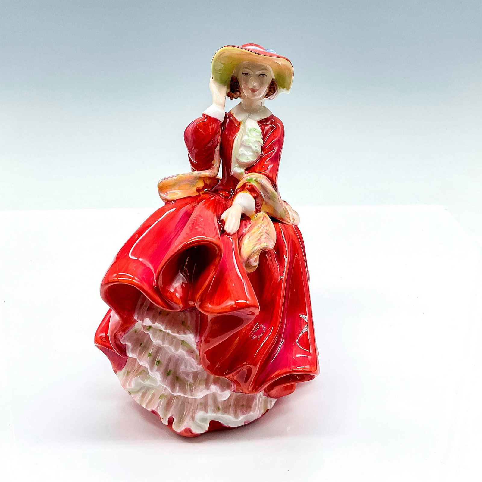 Top O' The Hill - HN1834 - Royal Doulton Figurine: Artist: Leslie Harradine Issued: 1937 - 2004 Dimensions: 7"H Manufacturer: Royal Doulton Country of Origin: England