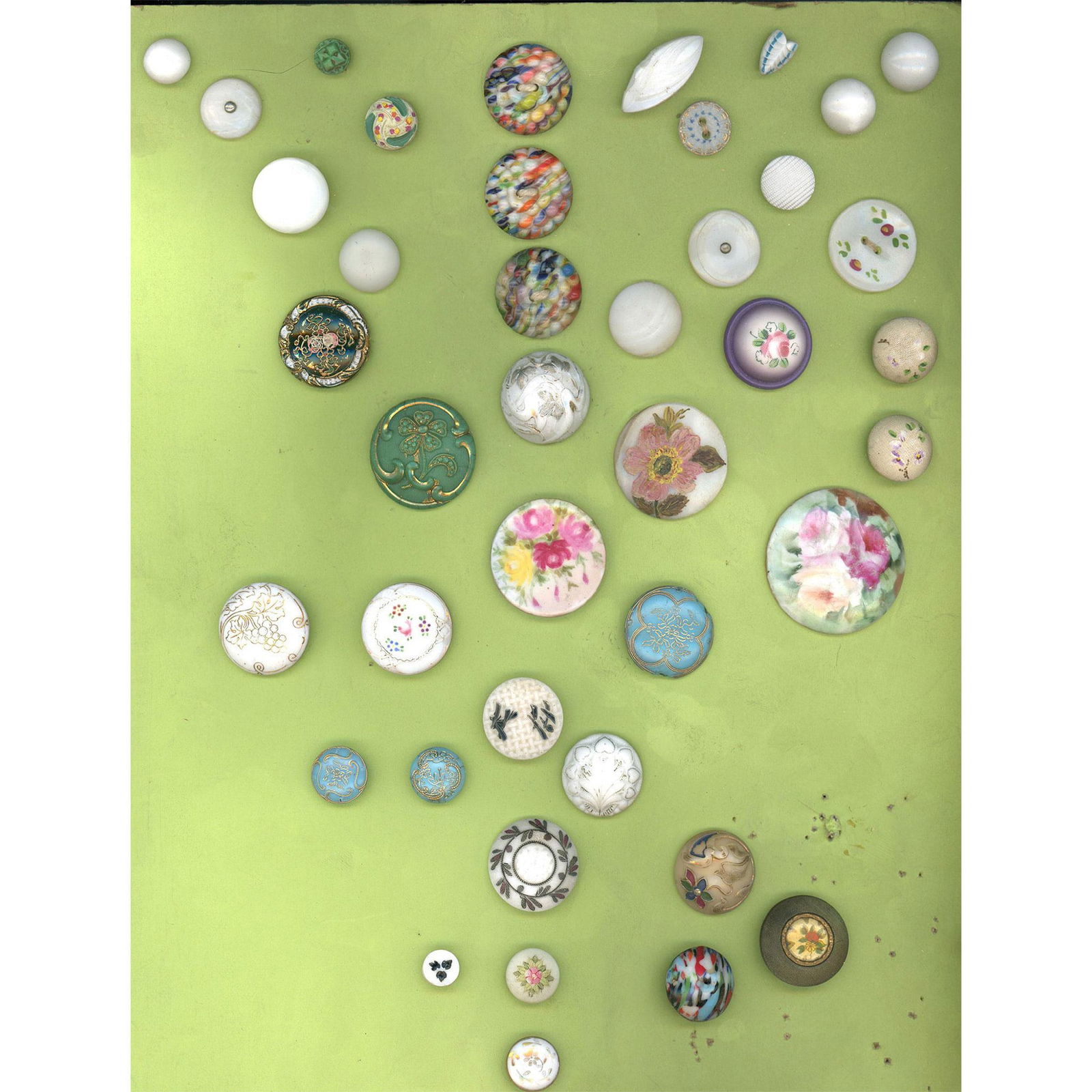 A card of assorted glass and porcelain buttons (1 of 5)