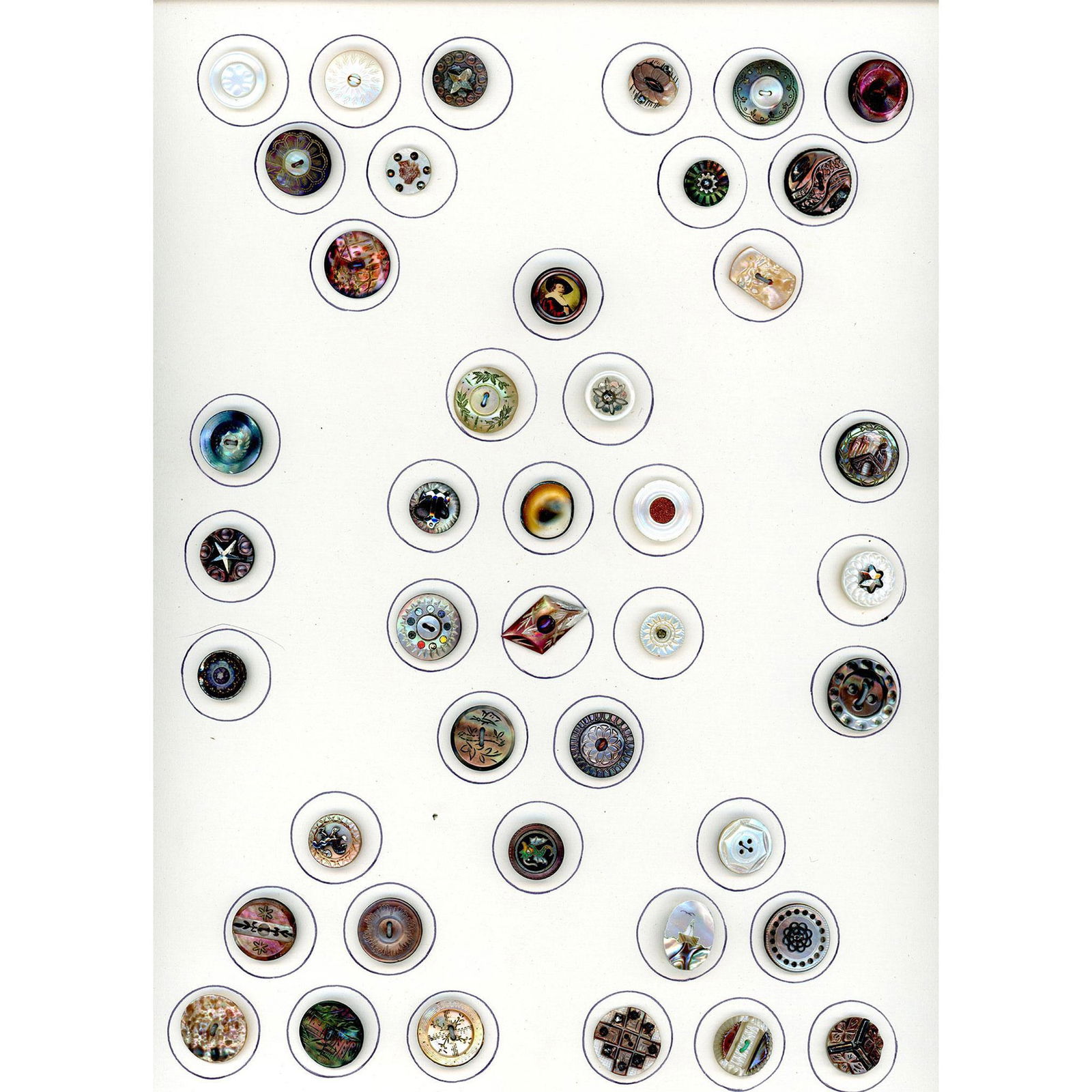 A whole card of assorted pearl and shell buttons (1 of 6)