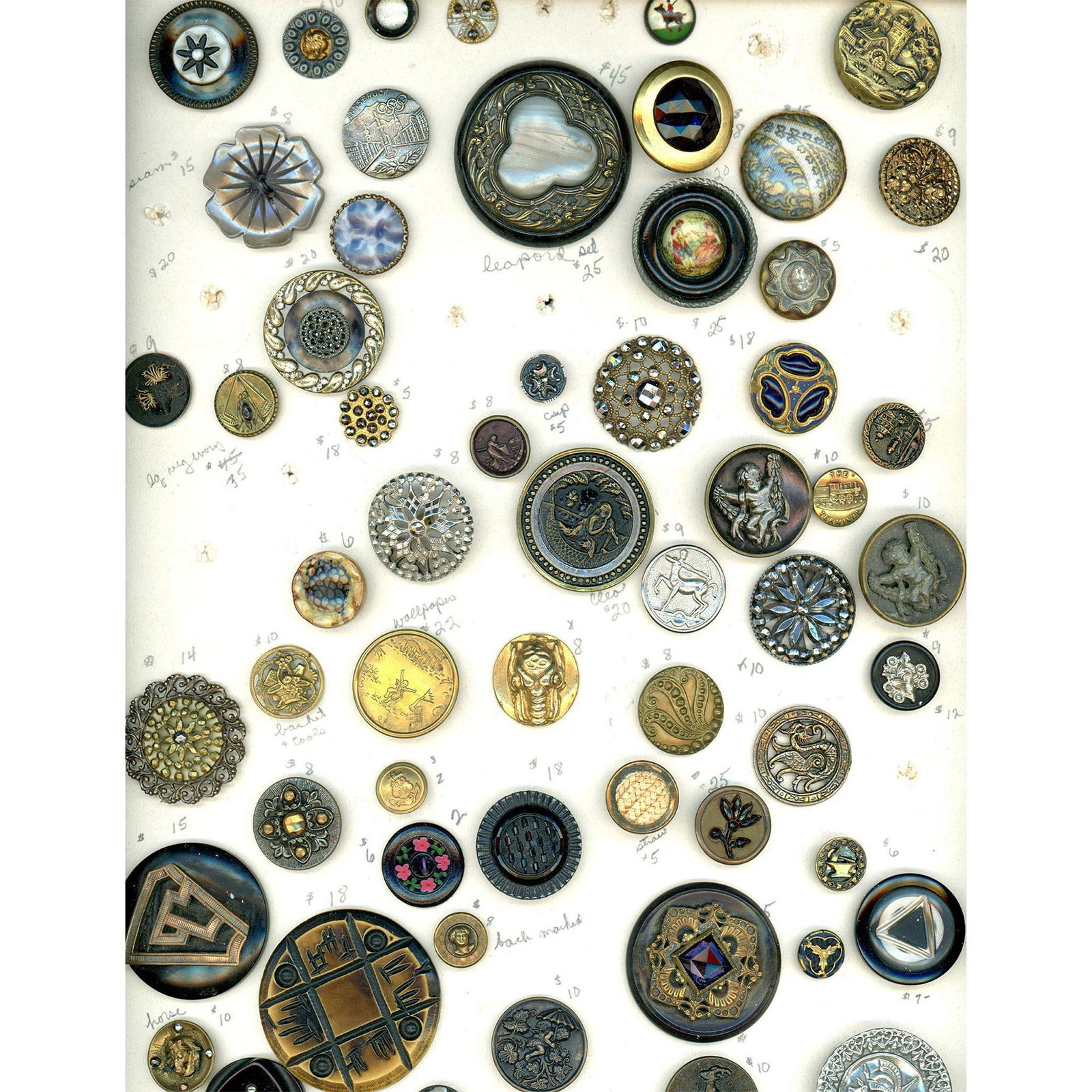A card of a large variety of assorted material buttons (1 of 4)