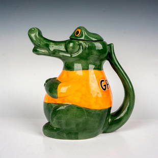 Carlton Ware Lidded Teapot, Gator: Hand painted in the shape of an alligator with Florida Gators jersey. Carton Ware backstamp. Dimensions: 5"L x 8.5"W x 8"H Manufacturer: Carlton Ware Country of Origin: England