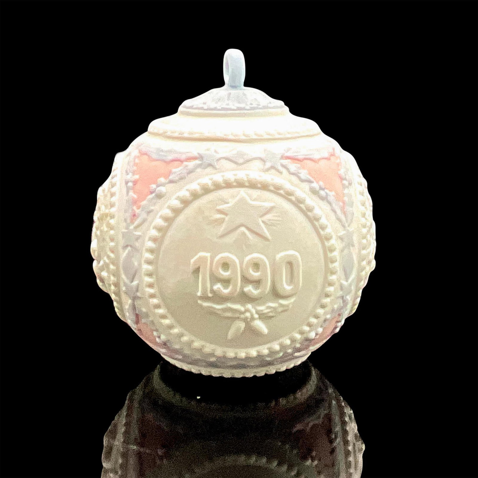 1990 Christmas Ball 1015730 - Lladro Porcelain Ornament: Matte finish; Lladro backstamp. Includes original box measuring 4.5"L x 4.75"W x 4.75"H. Artist: Francisco Polope Issued: 1990 Dimensions: 4"H Manufacturer: Lladro Country of Origin: Spain